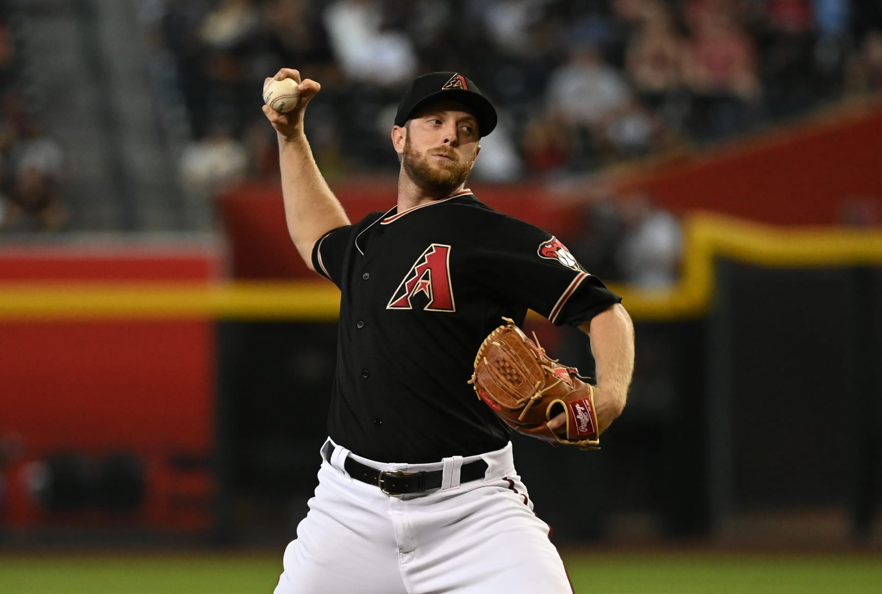 PHOENIX, ARIZONA - SEPTEMBER 24: Merrill Kelly #29 of the Arizona Diamondbacks delivers a first inning pitch against the San Francisco Giants at Chase Field on September 24, 2022 in Phoenix, Arizona. (Photo by Norm Hall/Getty Images)