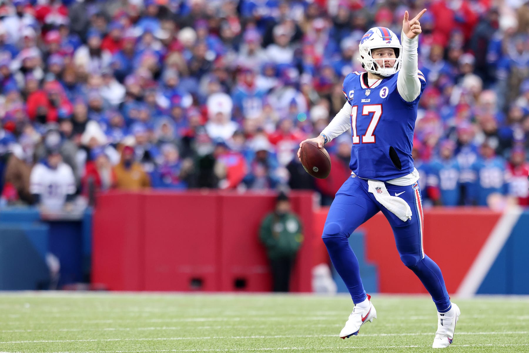 ORCHARD PARK, NEW YORK - JANUARY 08: Josh Allen #17 of the Buffalo Bills points downfield while attempting a pass during the third quarter against the New England Patriots at Highmark Stadium on January 08, 2023 in Orchard Park, New York. (Photo by Bryan M. Bennett/Getty Images)