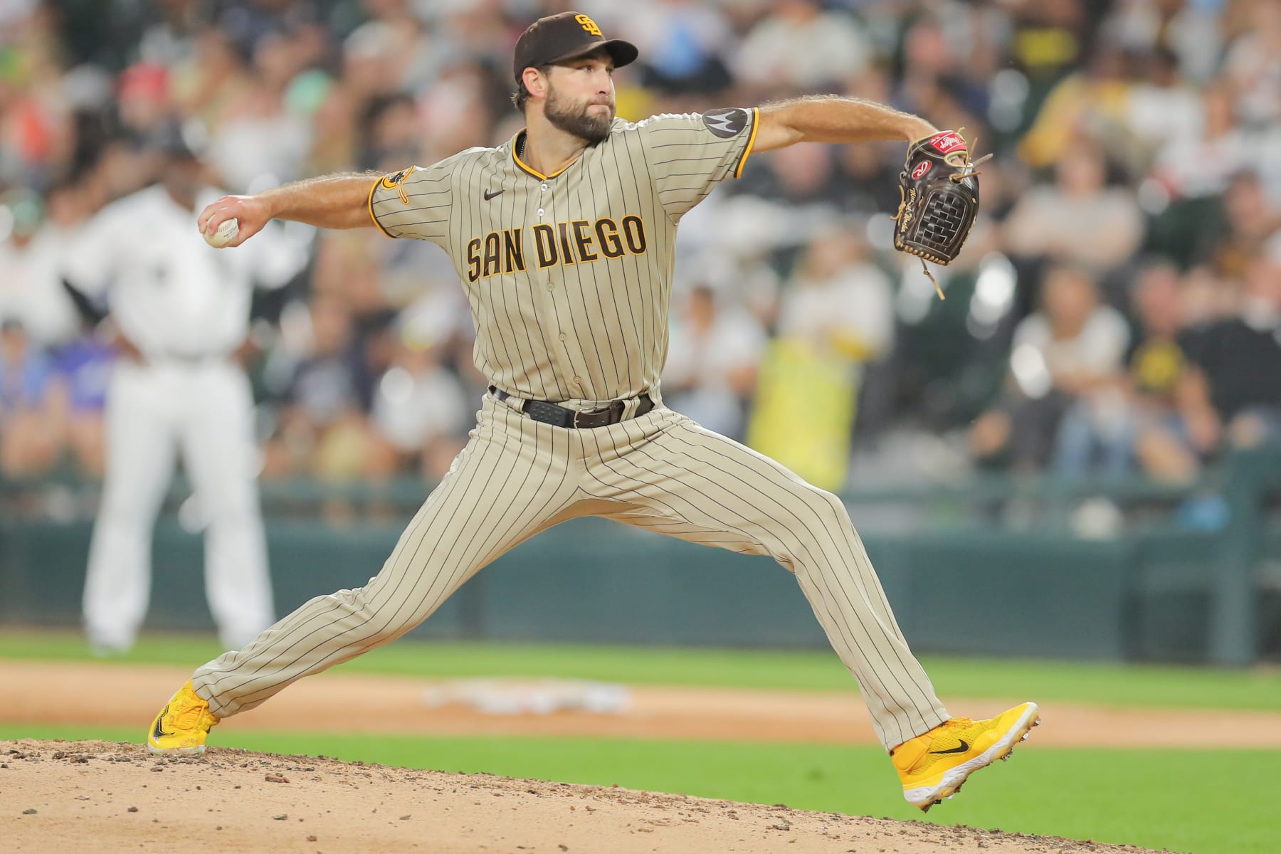 CHICAGO, IL - SEPTEMBER 30: San Diego Padres starting pitcher Michael Wacha (52) delivers a pitch 
during a Major League Baseball game between the San Diego Padres and the Chicago White Sox on September 30, 2023 at Guaranteed Rate Field in Chicago, IL. (Photo by Melissa Tamez/Icon Sportswire via Getty Images)