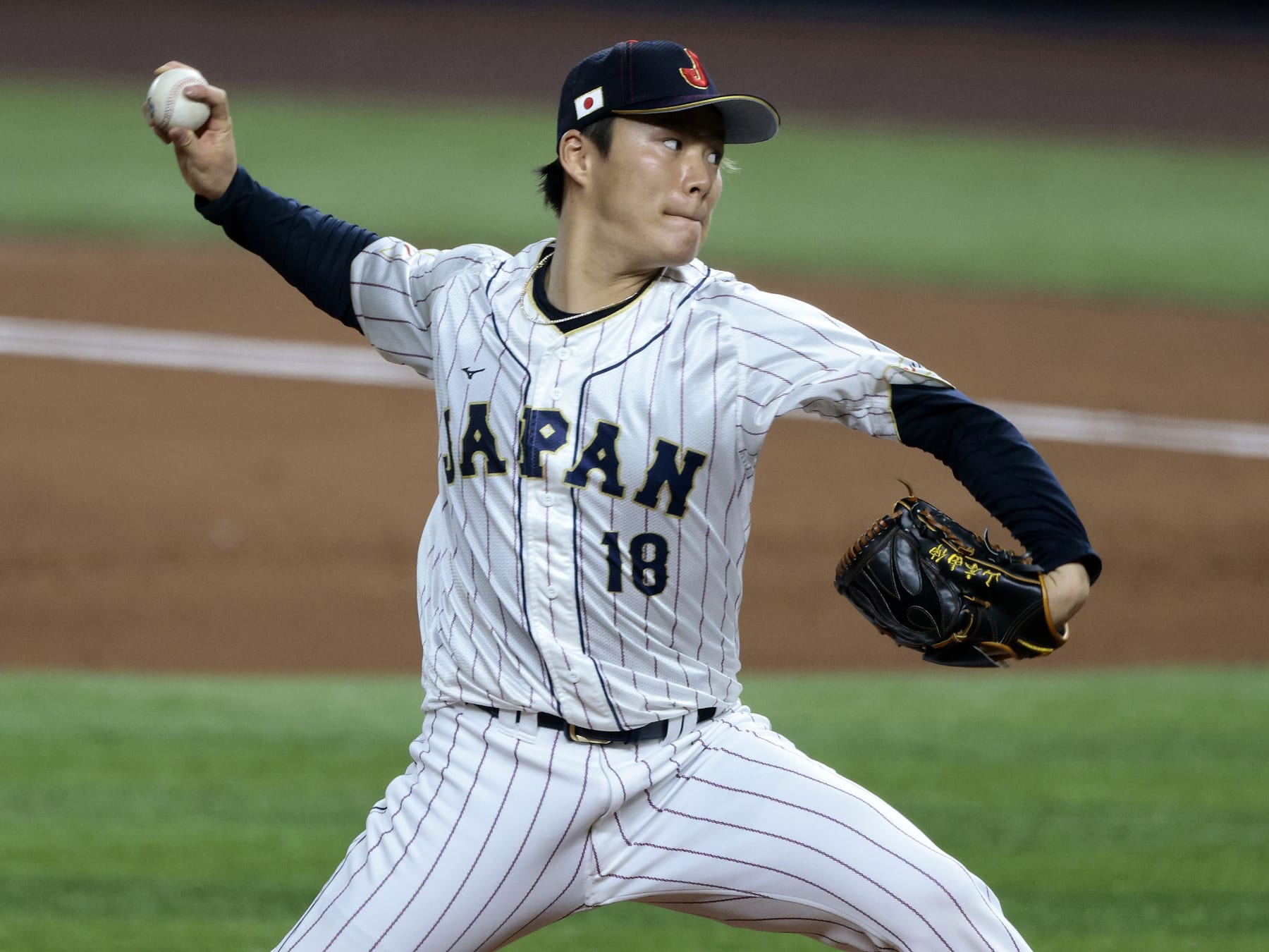 MIAMI, FL - MARCH 20: Yoshinobu Yamamoto #18 of Team Japan pitches during the 2023 World Baseball Classic Semifinal game against Team Mexico at loanDepot Park on Monday, March 20, 2023 in Miami, Florida. (Photo by Christopher Pasatieri/Getty Images)