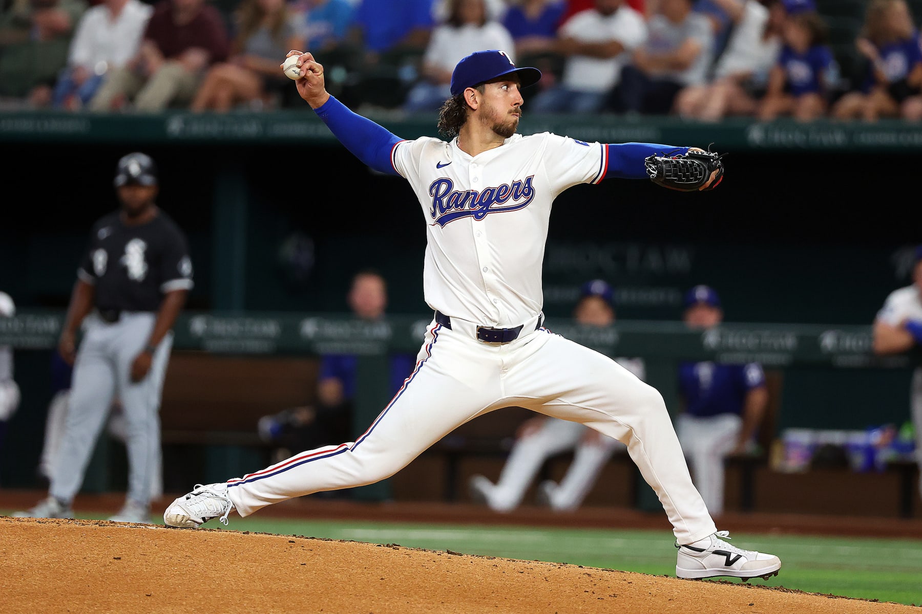 ARLINGTON, TEXAS - JULY 22: Michael Lorenzen #23 of the Texas Rangers pitches in the third inning against the Chicago White Sox at Globe Life Field on July 22, 2024 in Arlington, Texas. (Photo by Richard Rodriguez/Getty Images)
