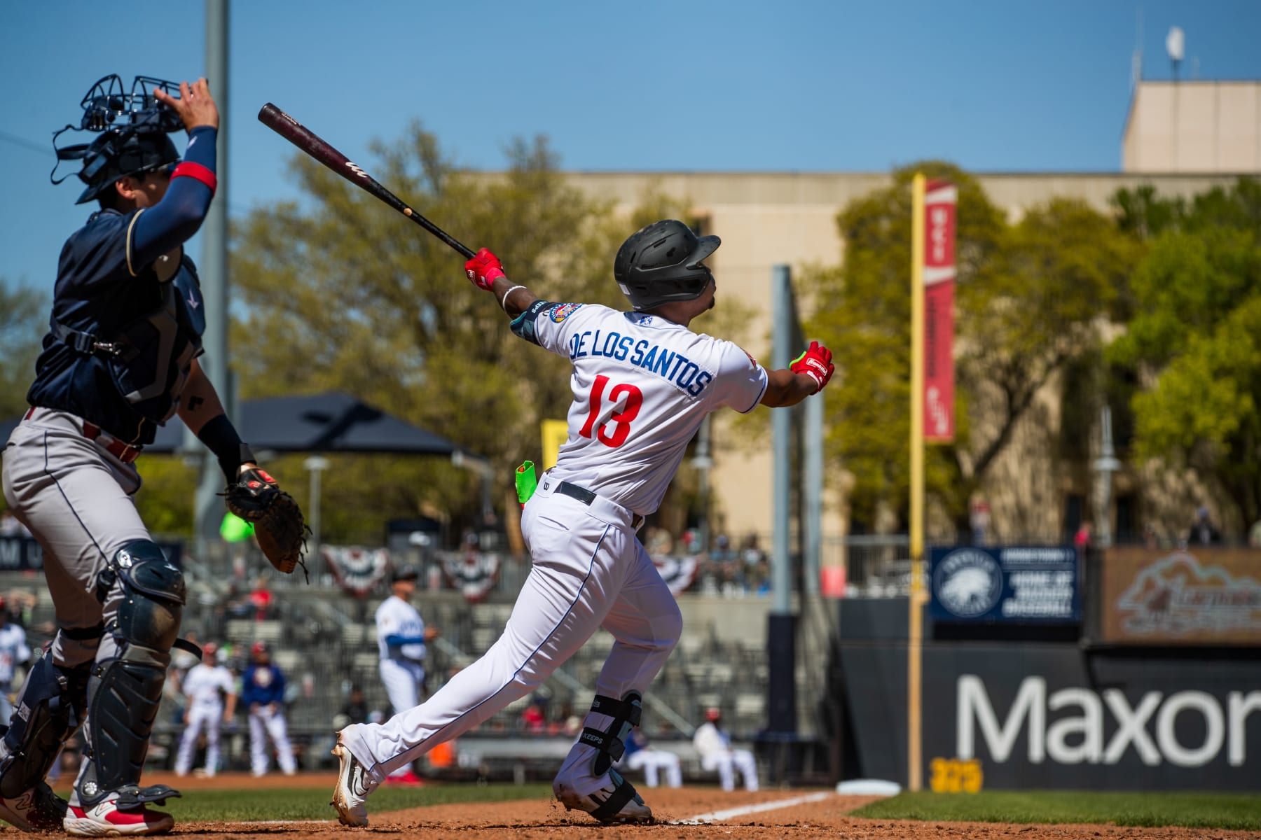 AMARILLO, TEXAS - APRIL 07: Deyvison De Los Santos #13 of the Amarillo Sod Poodles hits the ball during the game against the San Antonio Missions at HODGETOWN Stadium on April 07, 2024 in Amarillo, Texas. (Photo by John E. Moore III/Getty Images)