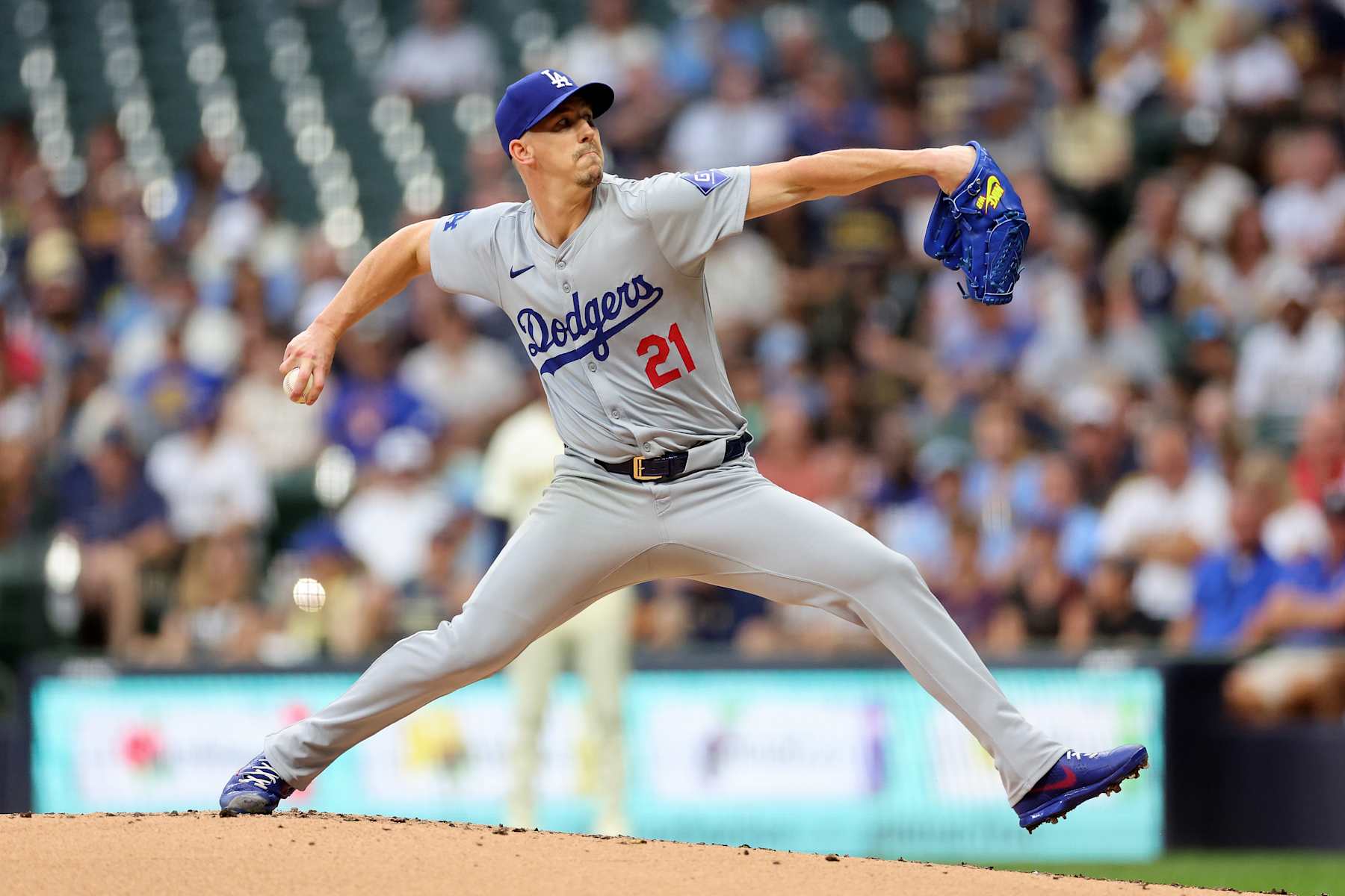 MILWAUKEE, WISCONSIN - AUGUST 14: Walker Buehler #21 of the Los Angeles Dodgers throws a pitch during the first inning against the Milwaukee Brewers at American Family Field on August 14, 2024 in Milwaukee, Wisconsin. (Photo by Stacy Revere/Getty Images)