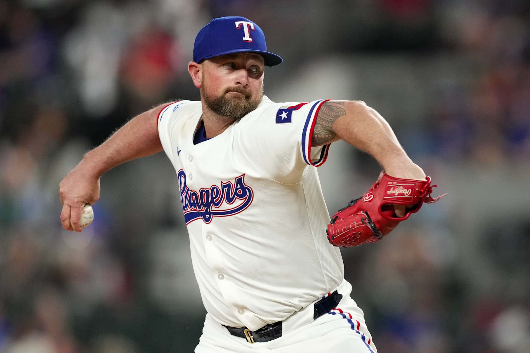 ARLINGTON, TEXAS - AUGUST 19: Kirby Yates #39 of the Texas Rangers pitches during the ninth inning against the Pittsburgh Pirates at Globe Life Field on August 19, 2024 in Arlington, Texas. (Photo by Sam Hodde/Getty Images)