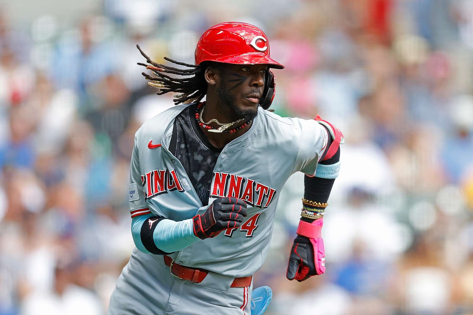 MILWAUKEE, WISCONSIN - AUGUST 11: Elly De La Cruz #44 of the Cincinnati Reds takes off running after the swing during the game against the Milwaukee Brewers at American Family Field on August 11, 2024 in Milwaukee, Wisconsin. (Photo by John Fisher/Getty Images)