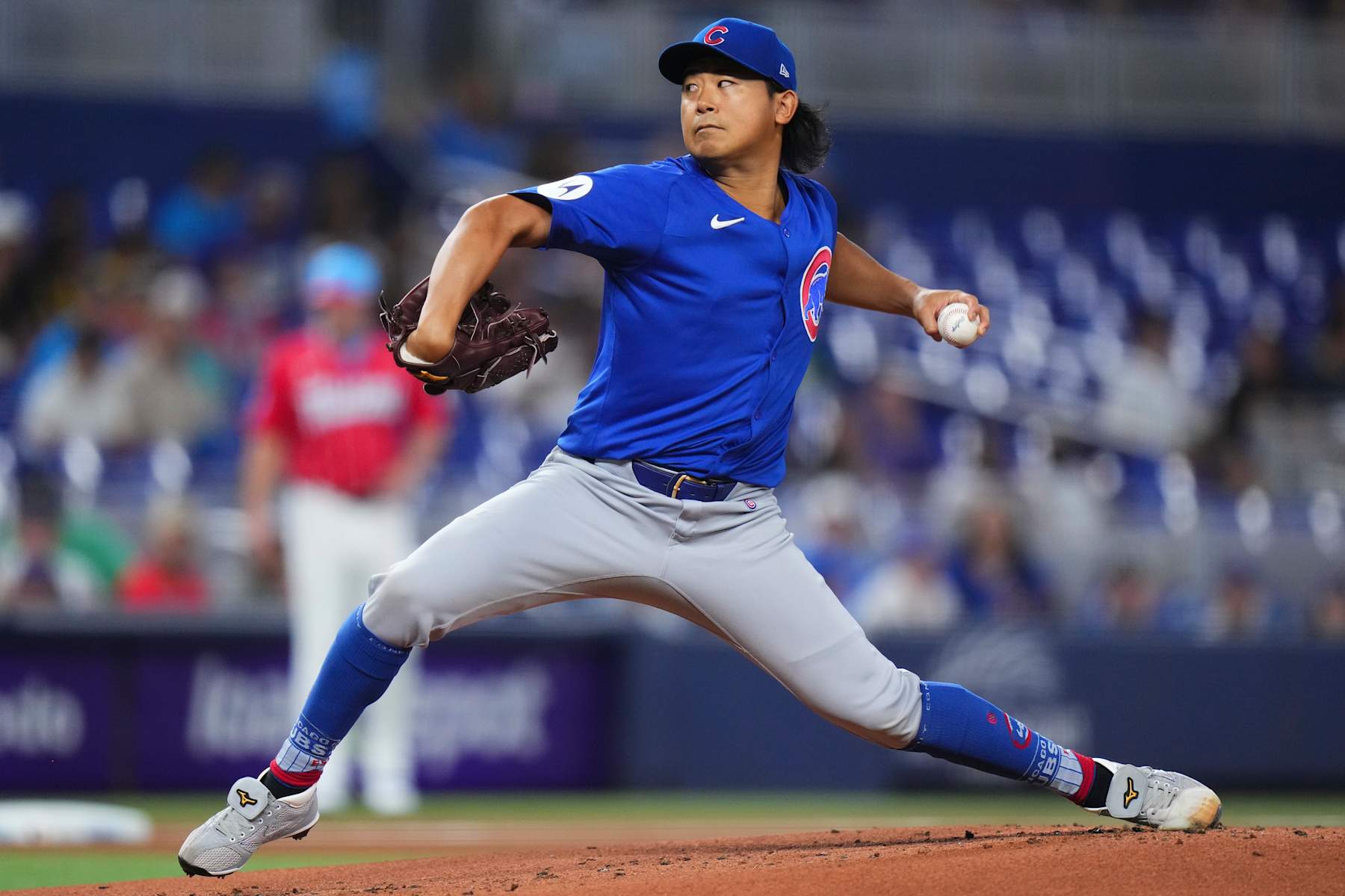 MIAMI, FLORIDA - AUGUST 24: Shota Imanaga #18 of the Chicago Cubs throws a pitch against the Miami Marlins during the first inning at loanDepot park on August 24, 2024 in Miami, Florida. (Photo by Rich Storry/Getty Images)