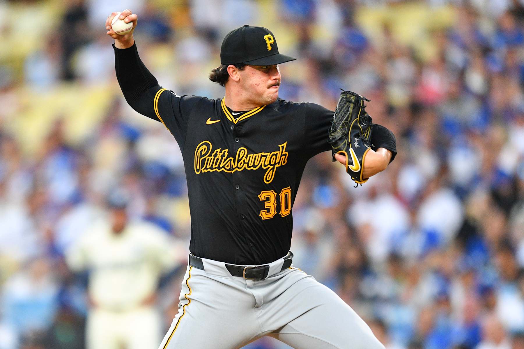 LOS ANGELES, CA - AUGUST 10: Pittsburgh Pirates pitcher Paul Skenes (30) throws a pitch during the MLB game between the Pittsburgh Pirates and the Los Angeles Dodgers on August 10, 2024 at Dodger Stadium in Los Angeles, CA. (Photo by Brian Rothmuller/Icon Sportswire via Getty Images)