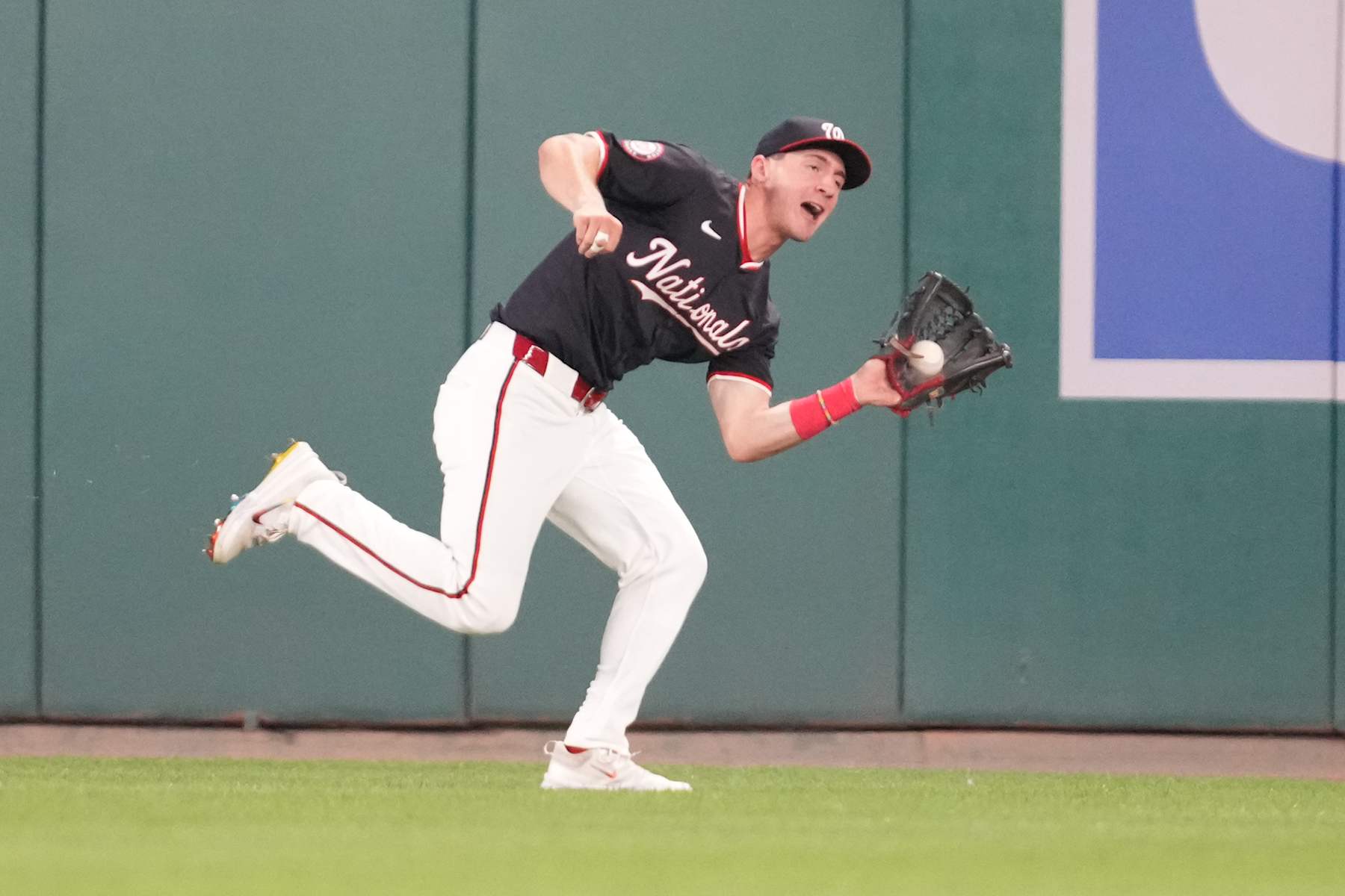 WASHINGTON, DC - AUGUST 27:  Jacob Young #30 of the Washington Nationals catches a fly ball during a baseball game against the New York Yankees at Nationals Park on August 27, 2024 in Washington, DC.  (Photo by Mitchell Layton/Getty Images)
