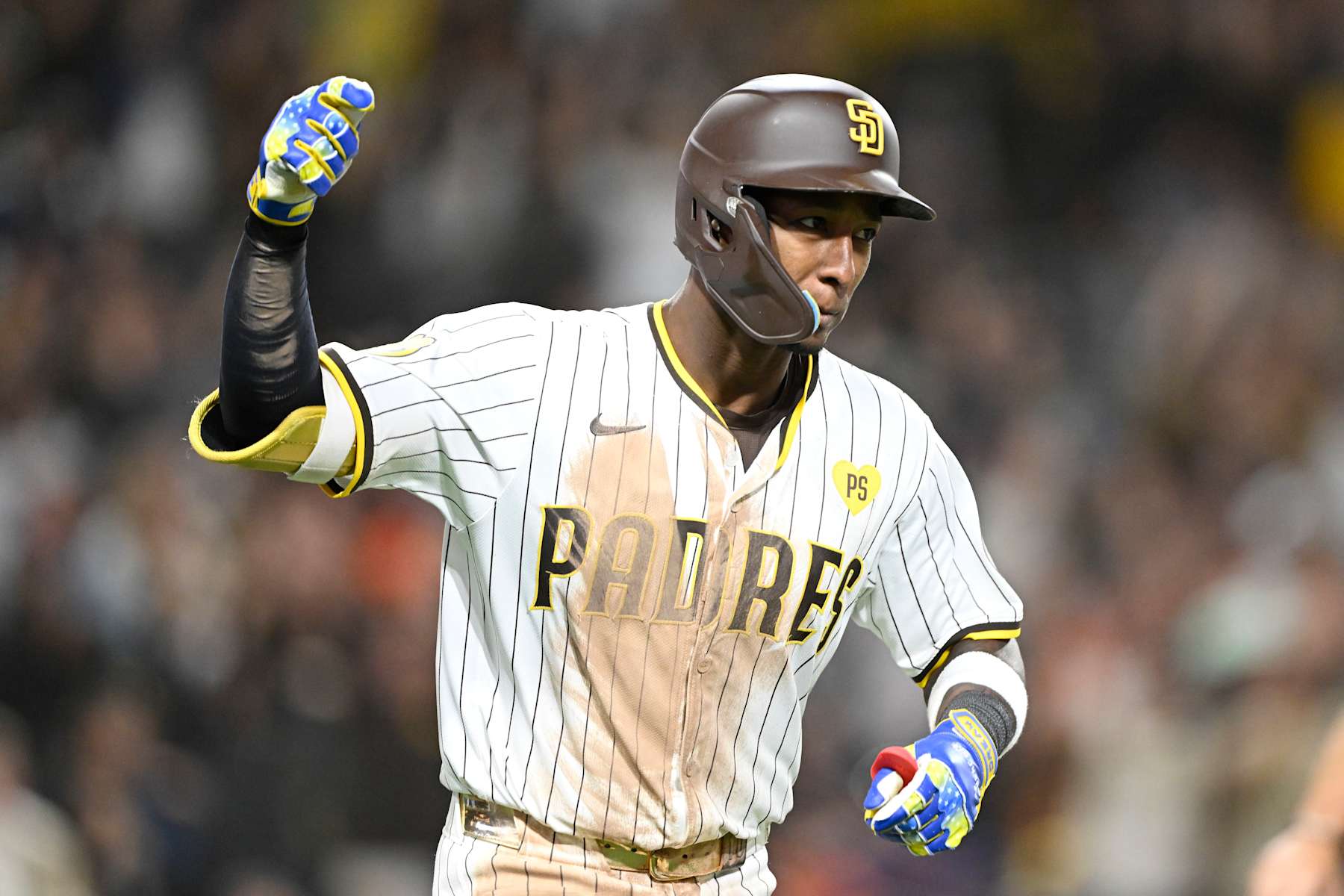 SAN DIEGO, CA - SEPTEMBER 16: Jurickson Profar #10 of the San Diego Padres rounds the bases after hitting a solo home run during the eighth inning of a baseball game against the Houston Astros, September 16, 2024 at Petco Park in San Diego, California. (Photo by Denis Poroy/Getty Images)