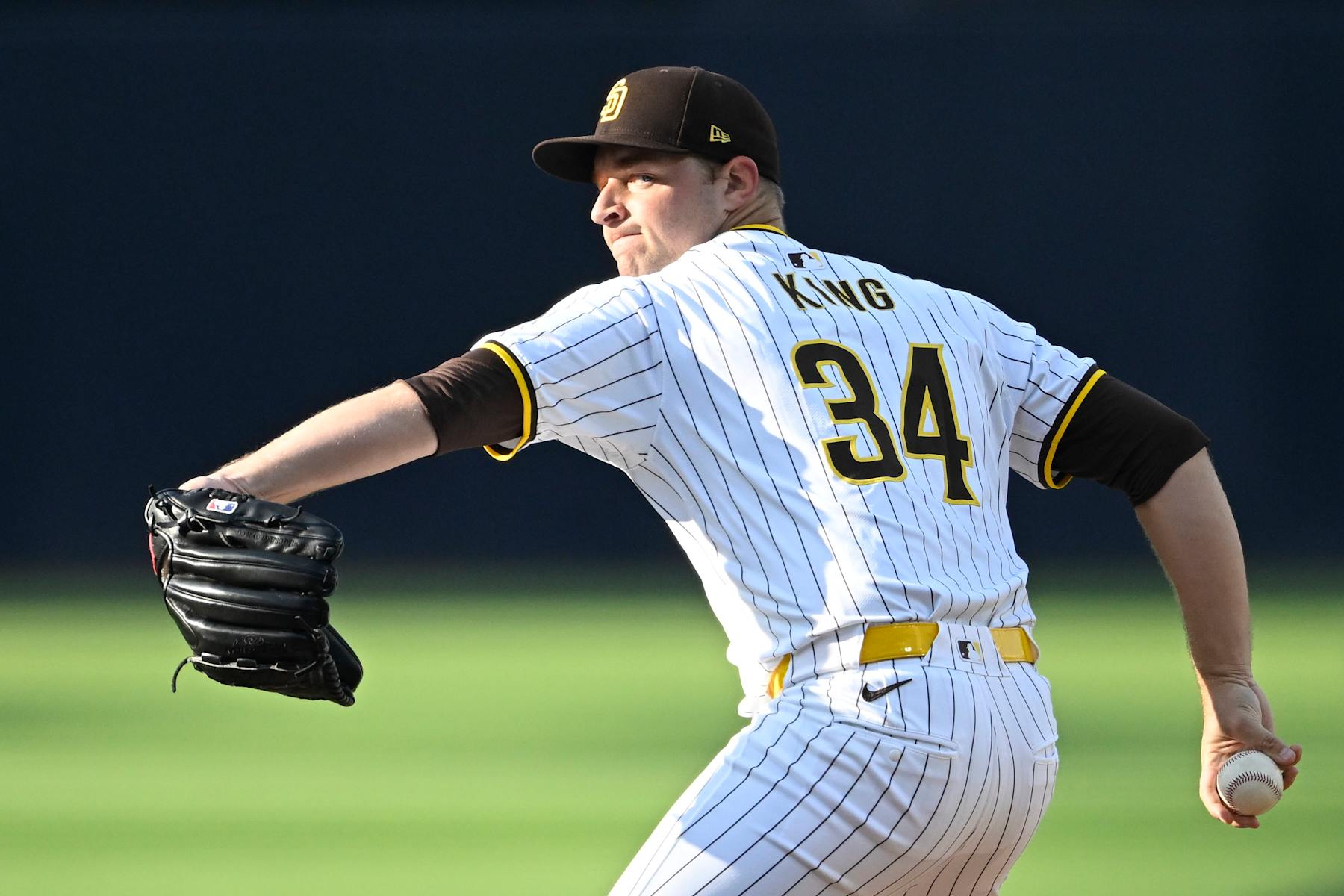SAN DIEGO, CA - AUGUST 24:   Michael King #34 of the San Diego Padres pitches during a baseball game against the New York Mets on  August 24, 2024 at Petco Park in San Diego, California. (Photo by Denis Poroy/Getty Images)