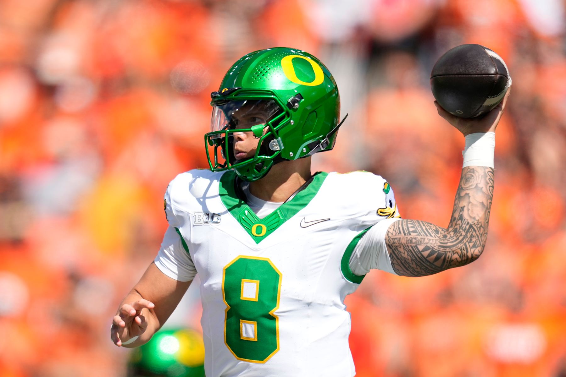 CORVALLIS, OREGON - SEPTEMBER 14: Dillon Gabriel #8 of the Oregon Ducks warms up before the game against the Oregon State Beavers at Reser Stadium on September 14, 2024 in Corvallis, Oregon.  (Photo by Soobum Im/Getty Images)