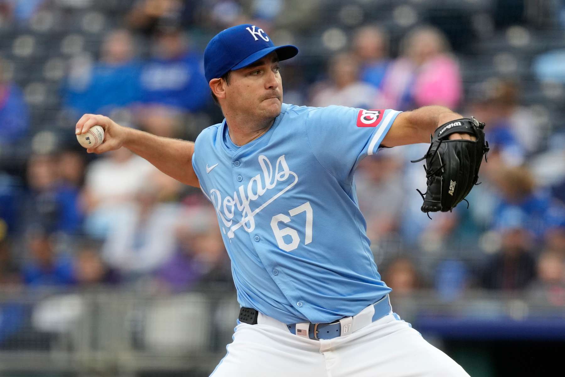 KANSAS CITY, MISSOURI - SEPTEMBER 22:  Seth Lugo #67 of the Kansas City Royals pitches in the first inning against the San Francisco Giants at Kauffman Stadium on September 22, 2024 in Kansas City, Missouri. (Photo by Ed Zurga/Getty Images)
