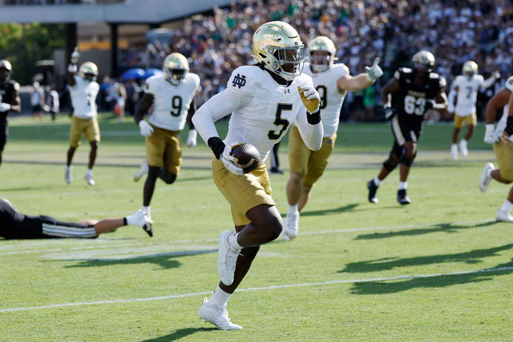 WEST LAFAYETTE, IN - SEPTEMBER 14: Notre Dame Fighting Irish defensive lineman Boubacar Traore (5) returns an interception for a 34-yard touchdown in the second quarter during a college football game against the Purdue Boilermakers on September 14, 2024 at Ross-Ade Stadium in West Lafayette, Indiana. (Photo by Joe Robbins/Icon Sportswire via Getty Images)