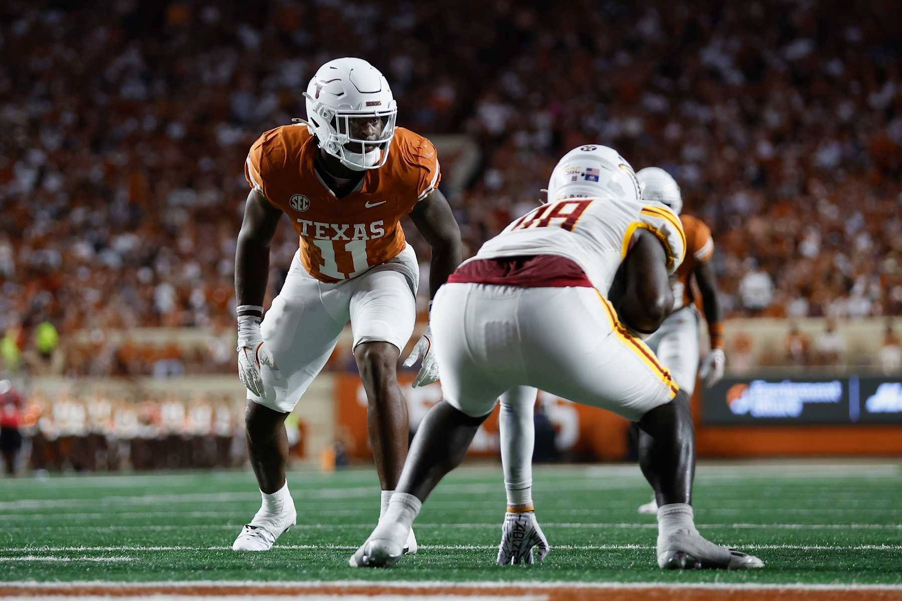 AUSTIN, TEXAS - SEPTEMBER 21: Colin Simmons #11 of the Texas Longhorns awaits the snap in the second half against the Louisiana Monroe Warhawks at Darrell K Royal-Texas Memorial Stadium on September 21, 2024 in Austin, Texas. (Photo by Tim Warner/Getty Images)