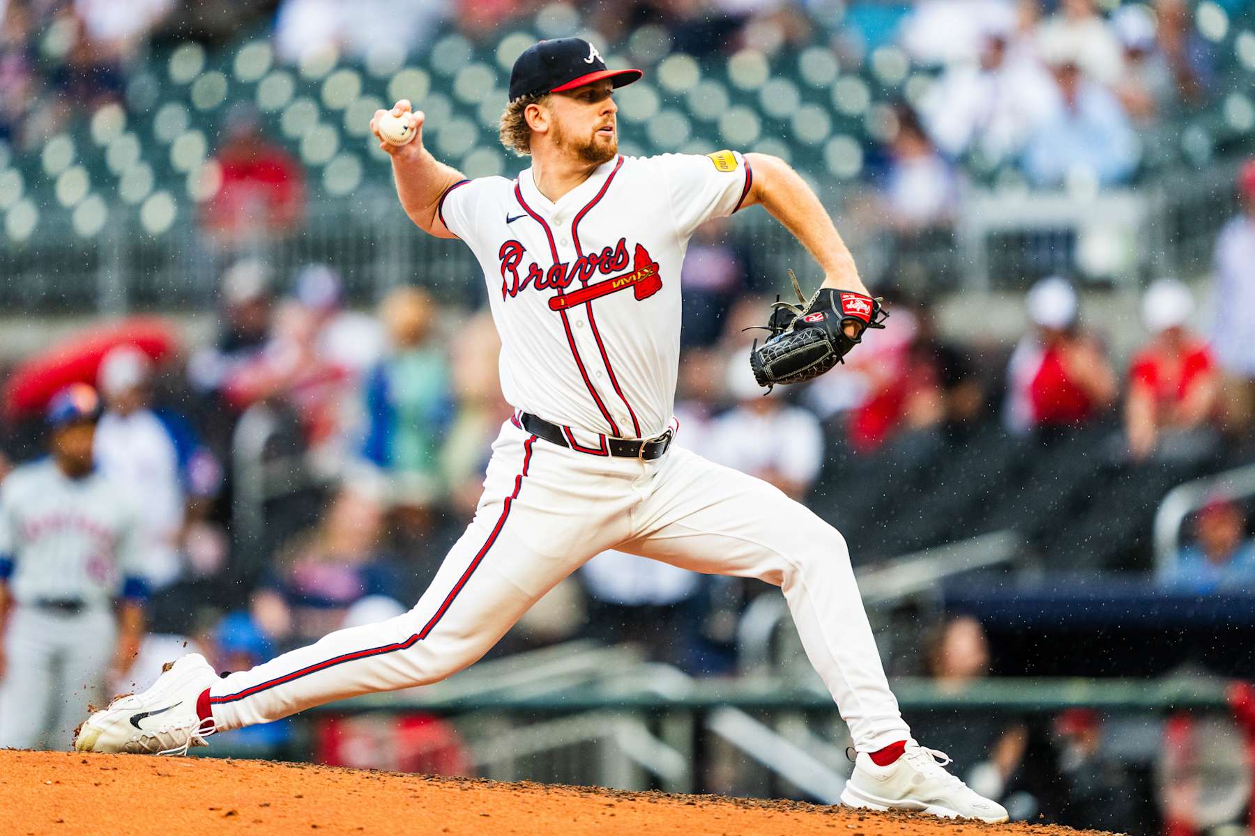 ATLANTA, GA - SEPTEMBER 30 Spencer Schwellenbach #56 of the Atlanta Braves pitches in the seventh inning during game one of a double header against the New York Mets at Truist Park on September 30, 2024 in Atlanta, Georgia. (Photo by Matthew Grimes Jr./Atlanta Braves/Getty Images)