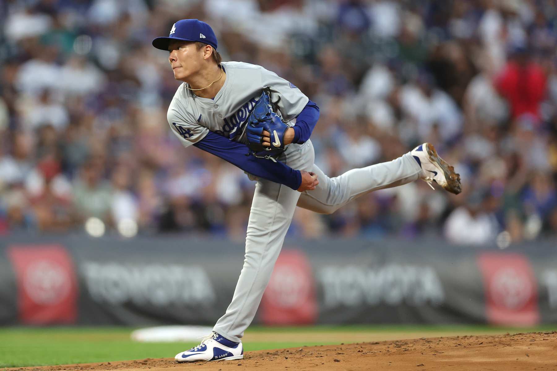 DENVER, COLORADO - SEPTEMBER 28: Starting pitcher Yoshinobu Yamamoto #18 of the Los Angeles Dodger throws against the Colorado Rockies in the second inning at Coors Field on September 28, 2024 in Denver, Colorado. (Photo by Matthew Stockman/Getty Images)