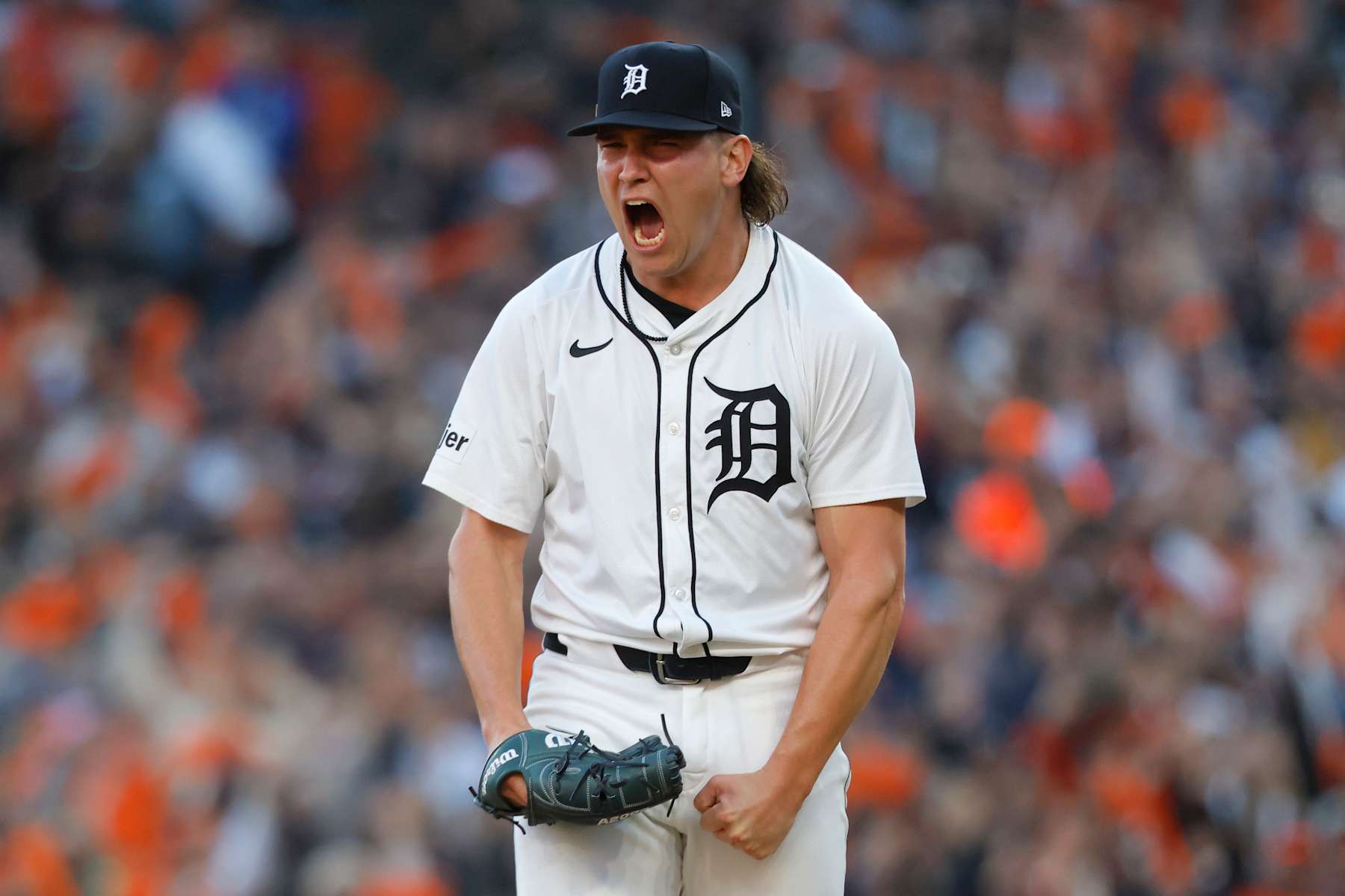 DETROIT, MICHIGAN - OCTOBER 09: Tyler Holton #87 of the Detroit Tigers reacts after striking out Austin Hedges #27 of the Cleveland Guardians in the ninth inning to end Game Three of the Division Series at Comerica Park on October 09, 2024 in Detroit, Michigan. (Photo by Duane Burleson/Getty Images)