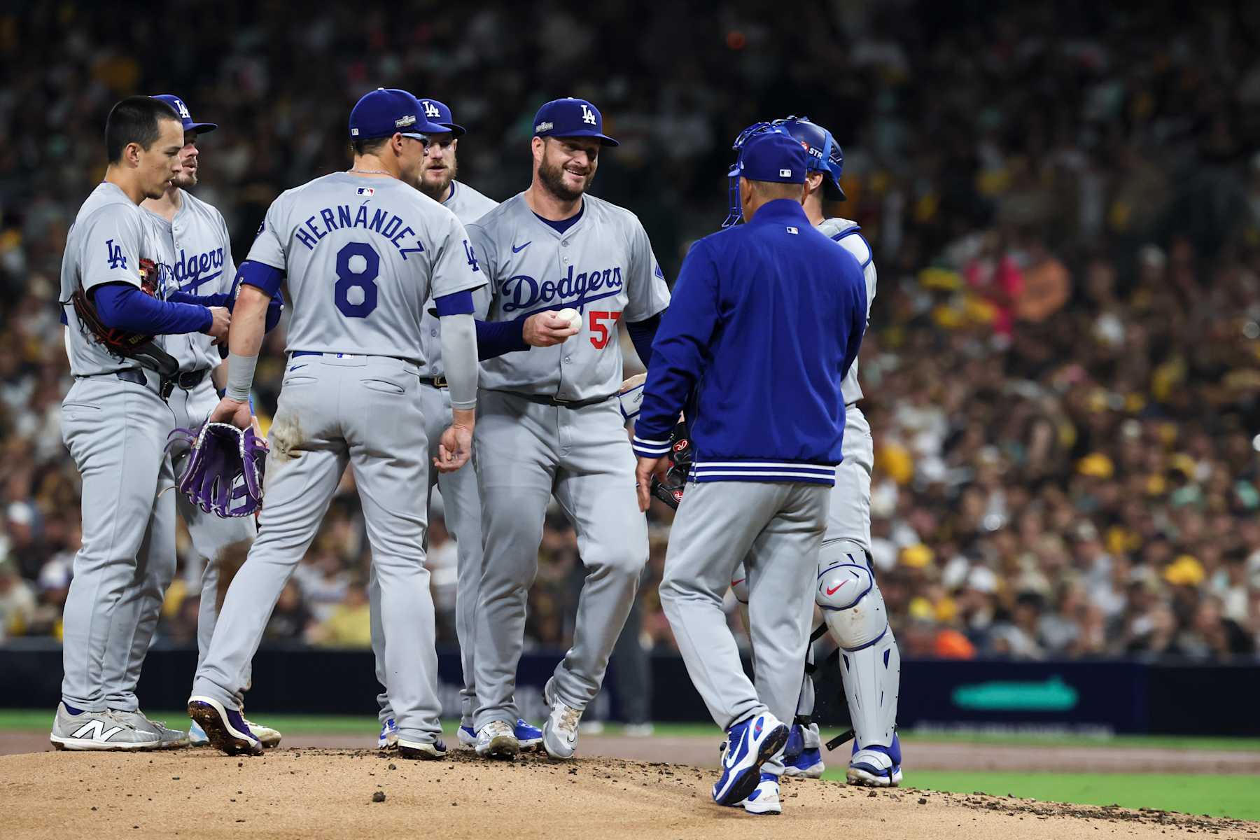 SAN DIEGO, CALIFORNIA - OCTOBER 09: Ryan Brasier #57 of the Los Angeles Dodgers reacts while being relieved by manager Dave Roberts during the third inning in game four of the National League Division Series against the San Diego Padres at Petco Park on Wednesday, Oct. 9, 2024 in San Diego. (Robert Gauthier / Los Angeles Times via Getty Images)