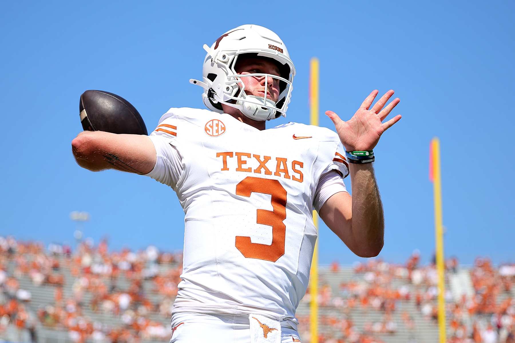 DALLAS, TEXAS - OCTOBER 12: Quinn Ewers #3 of the Texas Longhorns warms-up prior to a game against the Oklahoma Sooners at Cotton Bowl Stadium on October 12, 2024 in Dallas, Texas. (Photo by Alex Slitz/Getty Images)