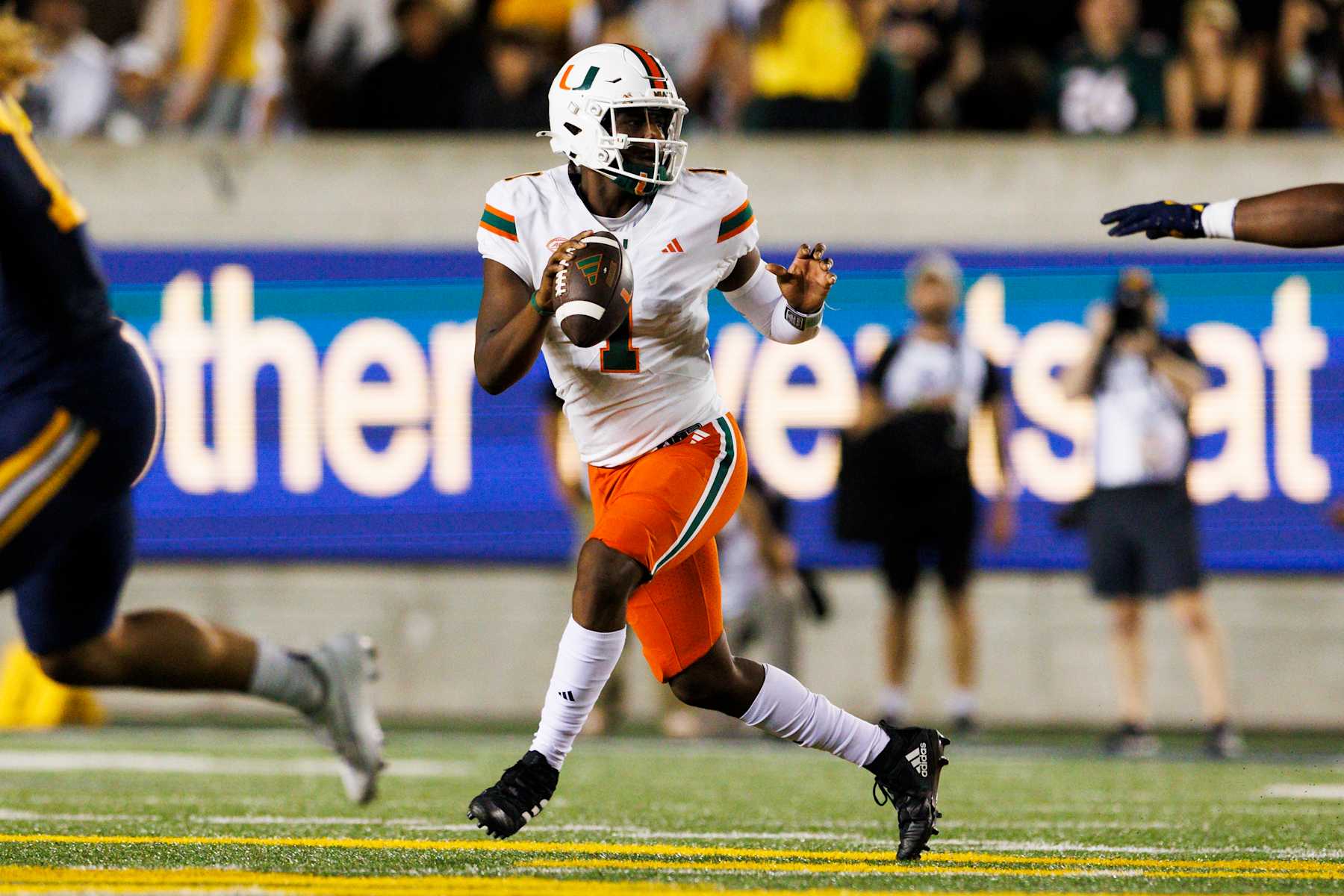 BERKELEY, CALIFORNIA - OCTOBER 5: Cam Ward #1 of the Miami Hurricanes scrambles during the second half against California Golden Bears at California Memorial Stadium on October 5, 2024 in Berkeley, California. (Photo by Ric Tapia/Getty Images)
