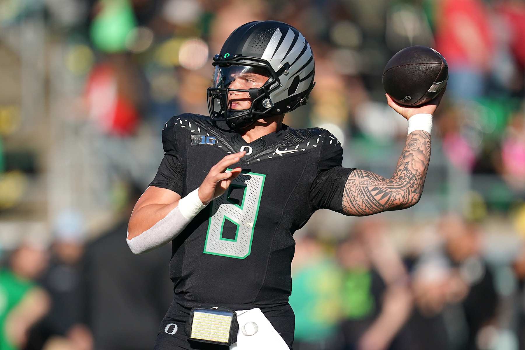 EUGENE, OREGON - OCTOBER 12: Dillon Gabriel #8 of the Oregon Ducks warms-up prior to a game against the Ohio State Buckeyes at Autzen Stadium on October 12, 2024 in Eugene, Oregon. (Photo by Ali Gradischer/Getty Images)