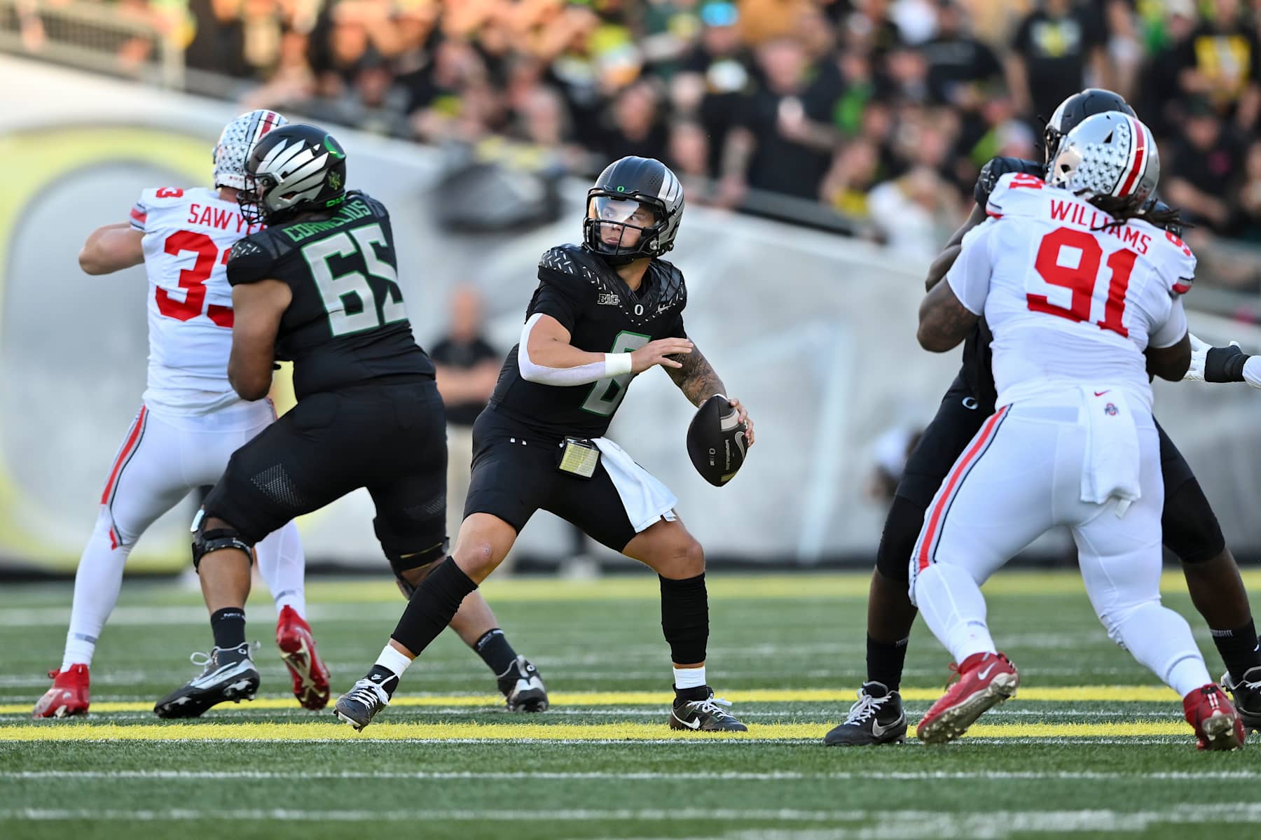 EUGENE, OREGON - OCTOBER 12: Dillon Gabriel #8 of the Oregon Ducks throws the ball during the second quarter of the game against the Ohio State Buckeyes at Autzen Stadium on October 12, 2024 in Eugene, Oregon. (Photo by Alika Jenner/Getty Images)