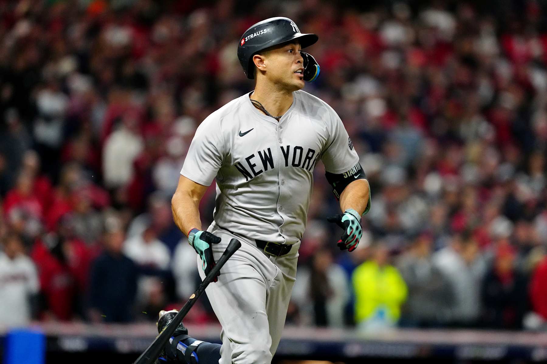 CLEVELAND, OH - OCTOBER 17:  Giancarlo Stanton #27 of the New York Yankees hits a solo home run in the eighth inning during Game 3 of the ALCS presented by loanDepot between the New York Yankees and the Cleveland Guardians at Progressive Field on Thursday, October 17, 2024 in Cleveland, Ohio. (Photo by Mary DeCicco/MLB Photos via Getty Images)