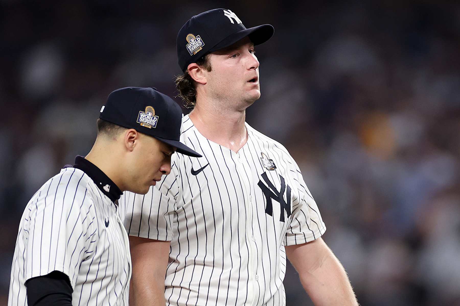 NEW YORK, NEW YORK - OCTOBER 30:  Gerrit Cole #45 of the New York Yankees reacts after Teoscar Hernández #37 of the Los Angeles Dodgers hit a two-RBI double during the fifth inning of Game Five of the 2024 World Series at Yankee Stadium on October 30, 2024 in the Bronx borough of New York City. (Photo by Sarah Stier/Getty Images)