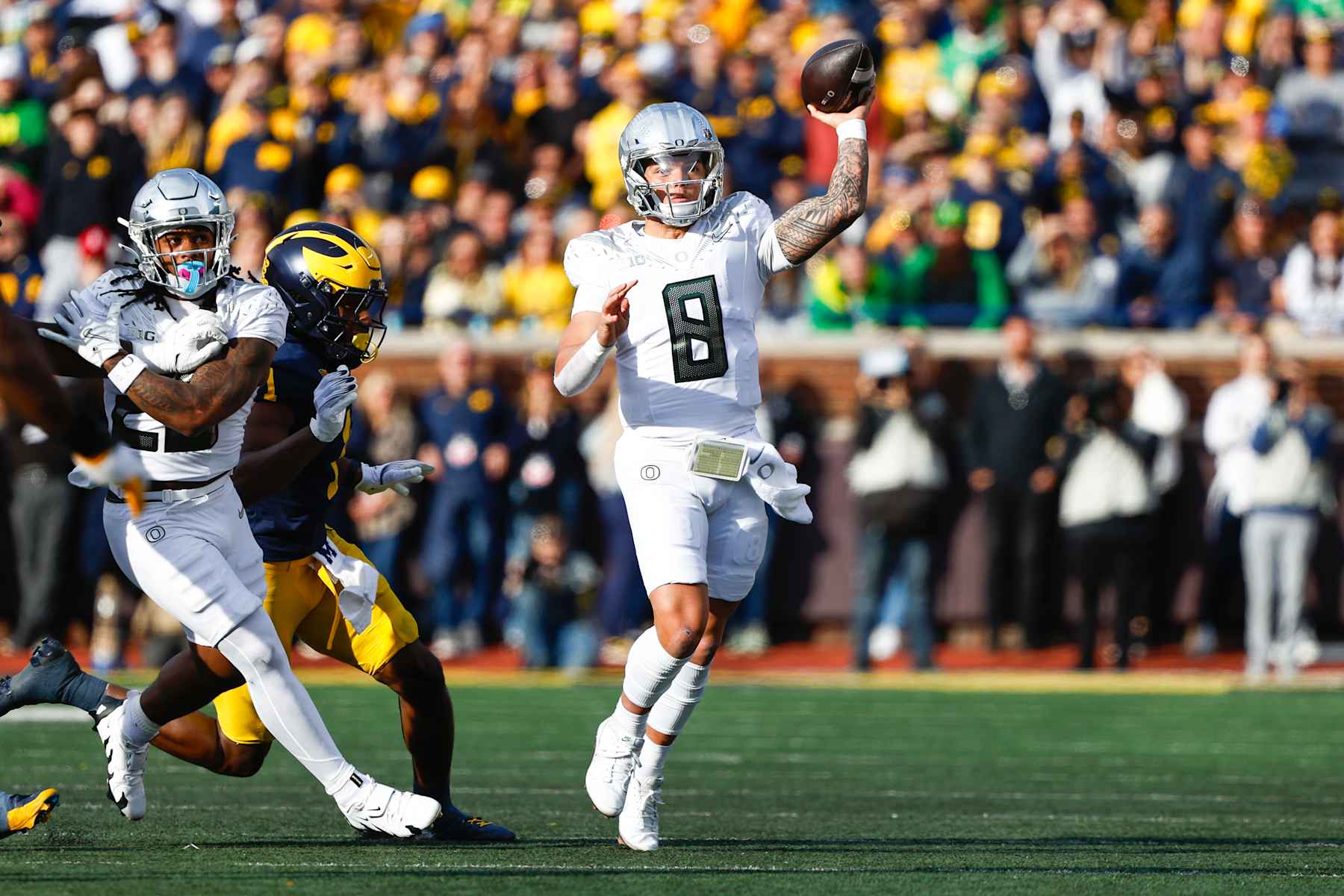 ANN ARBOR, MI - NOVEMBER 2: Dillon Gabriel #8 of Oregon throws the ball during a game between University of Oregon and University of Michigan at Michigan Stadium on November 2, 2024 in Ann Arbor, Michigan. (Photo by Michael Miller/ISI Photos/Getty Images)