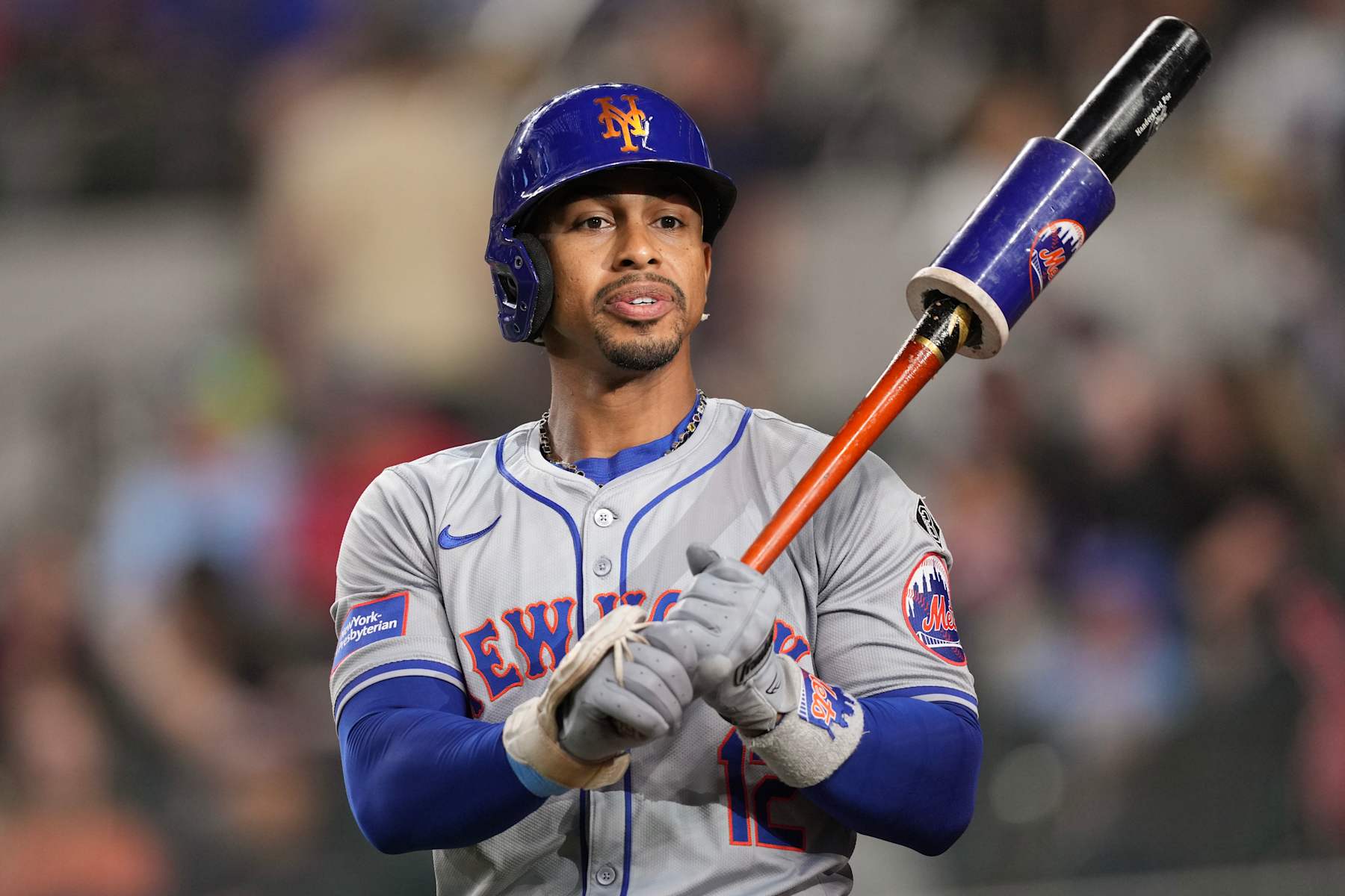 ARLINGTON, TEXAS - JUNE 17: Francisco Lindor #12 of the New York Mets waits in the on deck circle before the game against the Texas Rangers at Globe Life Field on June 17, 2024 in Arlington, Texas. (Photo by Sam Hodde/Getty Images)