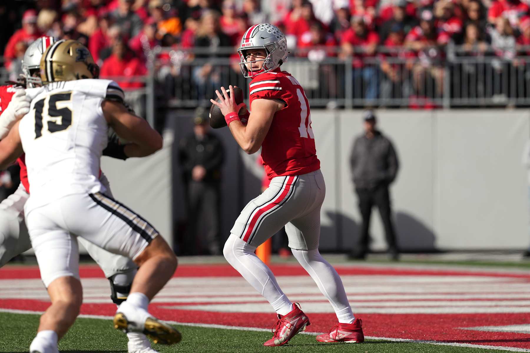 COLUMBUS, OHIO - NOVEMBER 09: Quarterback Will Howard #18 of the Ohio State Buckeyes looks to pass the ball during the first quarter against the Purdue Boilermakers at Ohio Stadium on November 09, 2024 in Columbus, Ohio. (Photo by Jason Mowry/Getty Images)