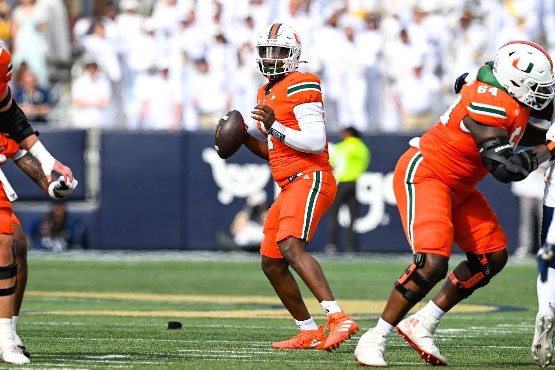 ATLANTA, GA  NOVEMBER 09:  Miami quarterback Cam Ward (1) drops back to pass during the college football game between the Miami Hurricanes and the Georgia Tech Yellow Jackets on November 9th, 2024 at Mercedes-Benz Stadium in Atlanta, GA.  (Photo by Rich von Biberstein/Icon Sportswire via Getty Images)