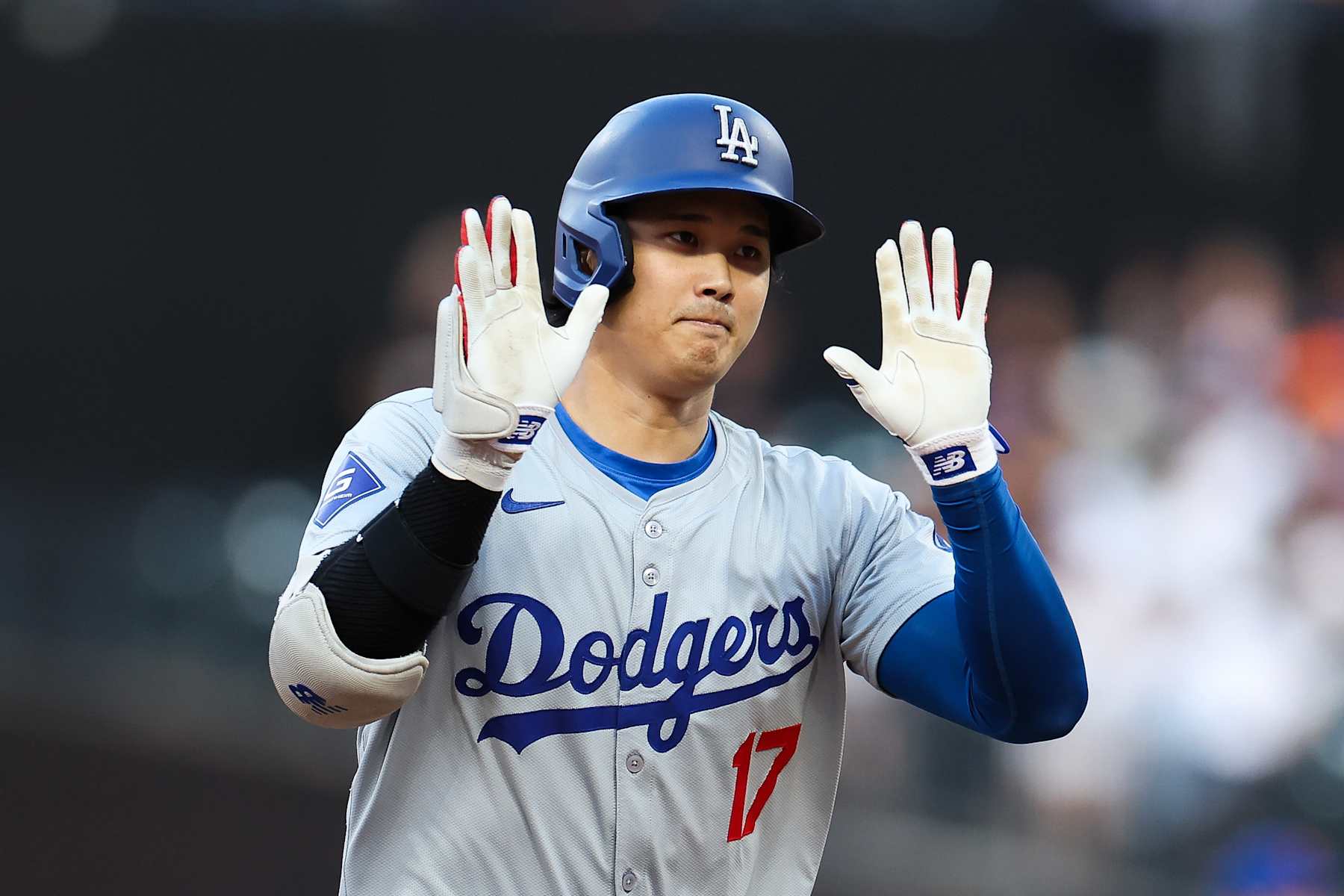 NEW YORK, NEW YORK - MAY 29: Shohei Ohtani #17 of the Los Angeles Dodgers reacts ater hitting a two-run home run against the New York Mets during the eighth inning at Citi Field on May 29, 2024 in the Queens borough of New York City. (Photo by Luke Hales/Getty Images)