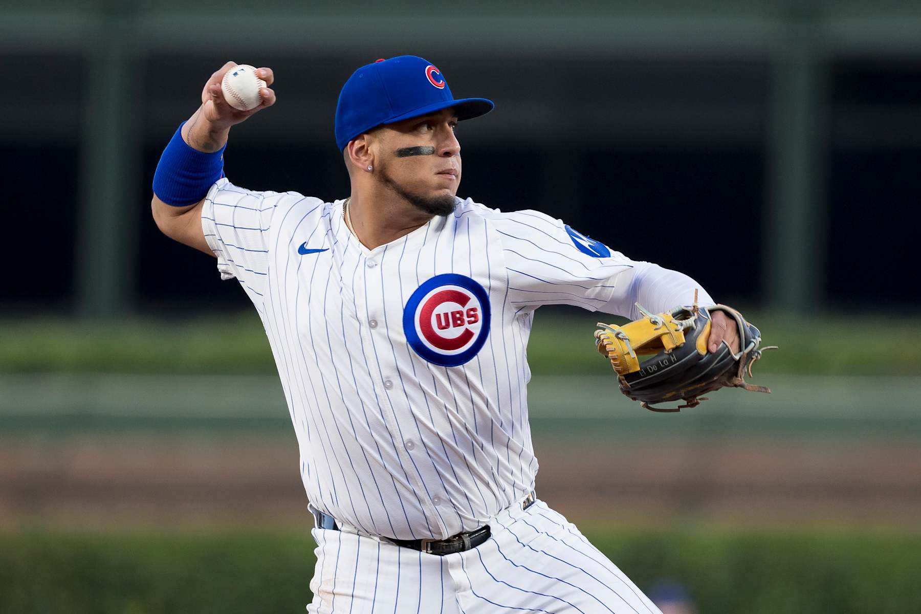 CHICAGO, ILLINOIS - SEPTEMBER 03: Isaac Paredes #17 of the Chicago Cubs throws on to first base in a game against the Pittsburgh Pirates at Wrigley Field on September 3, 2024 in Chicago, Illinois. (Photo by Matt Dirksen/Chicago Cubs/Getty Images)