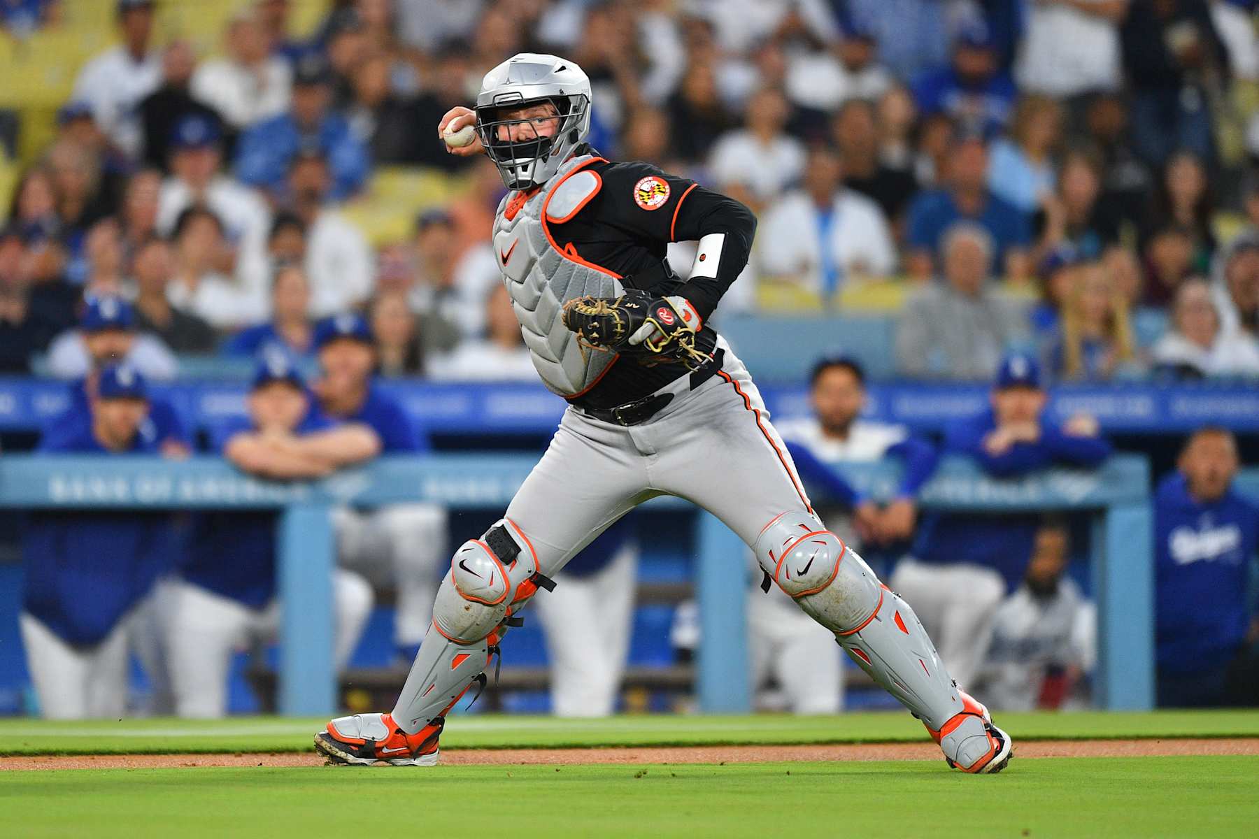 LOS ANGELES, CA - AUGUST 29: Baltimore Orioles catcher Adley Rutschman (35) looks to throw to first base during the MLB game between the Baltimore Orioles and the Los Angeles Dodgers on August 29, 2024 at Dodger Stadium in Los Angeles, CA. (Photo by Brian Rothmuller/Icon Sportswire via Getty Images)