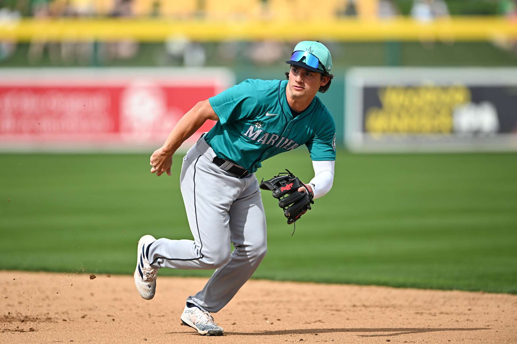 MESA, ARIZONA - MARCH 12, 2024: Cole Young #92 of the Seattle Mariners in the field during the sixth inning of a spring training game against the Oakland Athletics at Hohokam Stadium on March 12, 2024 in Mesa, Arizona. (Photo by Chris Bernacchi/Diamond Images via Getty Images)