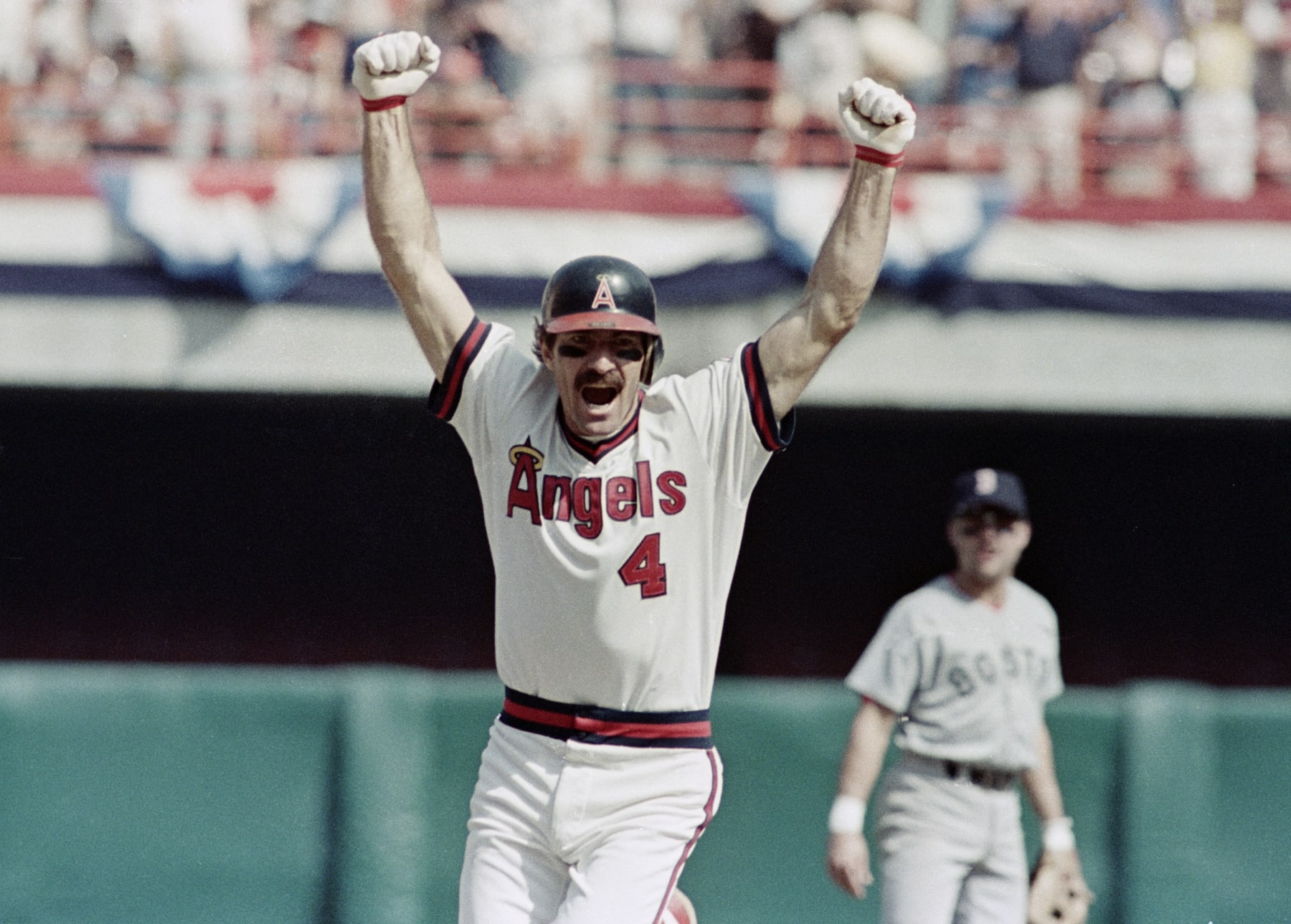 ANAHEIM, CALIFORNIA - OCTOBER 10 : California Angels Bobby Grich hits a home run and celebrates rounding 2nd base as during MLB playoff game, October 10, 1986 in Anaheim, California. (Photo by Bob Riha, Jr./Getty Images)