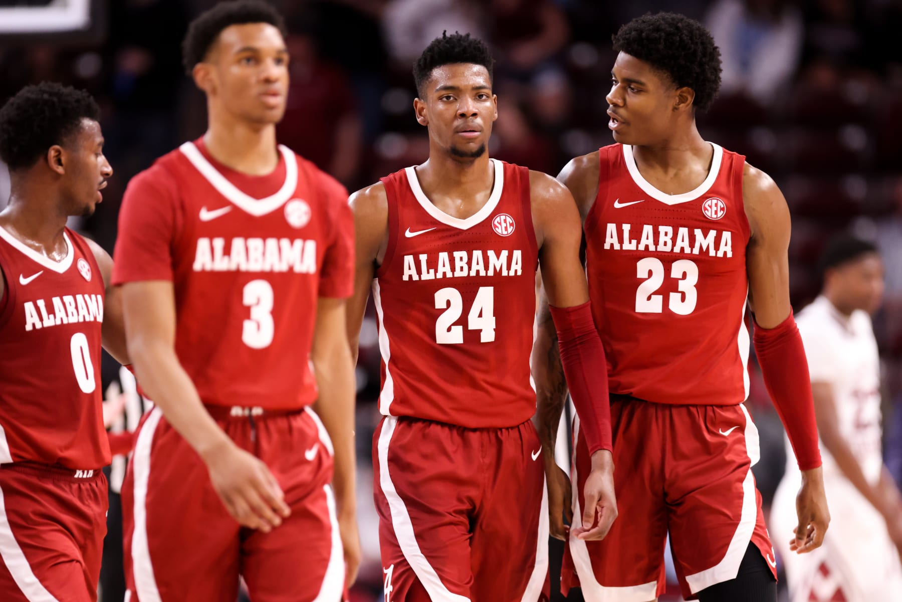 COLUMBIA, SC - FEBRUARY 22: Nick Pringle (23) talks to Brandon Miller (24) of the Alabama Crimson Tide as they walk back to the bench during a basketball game against the South Carolina Gamecocks on February 22, 2023 at Colonial Life Arena in Columbia, SC. (Photo by David Jensen/Icon Sportswire via Getty Images)