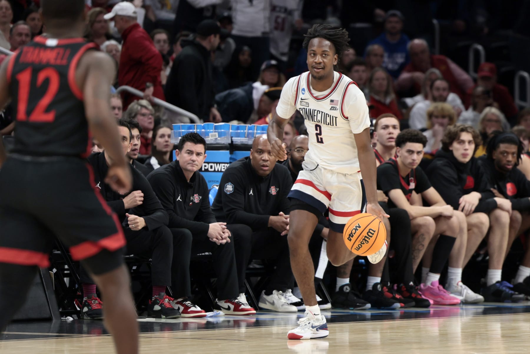 BOSTON, MA - MARCH 28: UCONN Huskies forward Tristen Newton (2) dribbles up court during an NCAA Sweet Sixteen game between the UCONN Huskies and the San Diego State Aztecs on March 28, 2024, at TD Garden in Boston, Massachusetts. (Photo by Fred Kfoury III/Icon Sportswire via Getty Images)