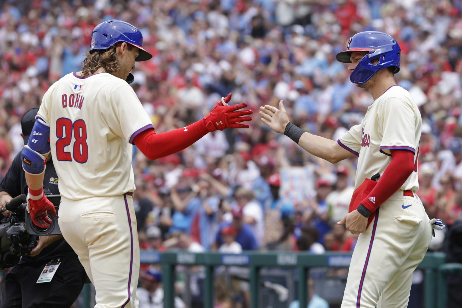 PHILADELPHIA, PENNSYLVANIA - JUNE 30: Alec Bohm #28 of the Philadelphia Phillies is congratulated by Trea Turner #7 of the Philadelphia Phillies after hitting a two-run home run during the first inning of a game at Citizens Bank Park on June 30, 2024 in Philadelphia, Pennsylvania. (Photo by Rich Schultz/Getty Images)