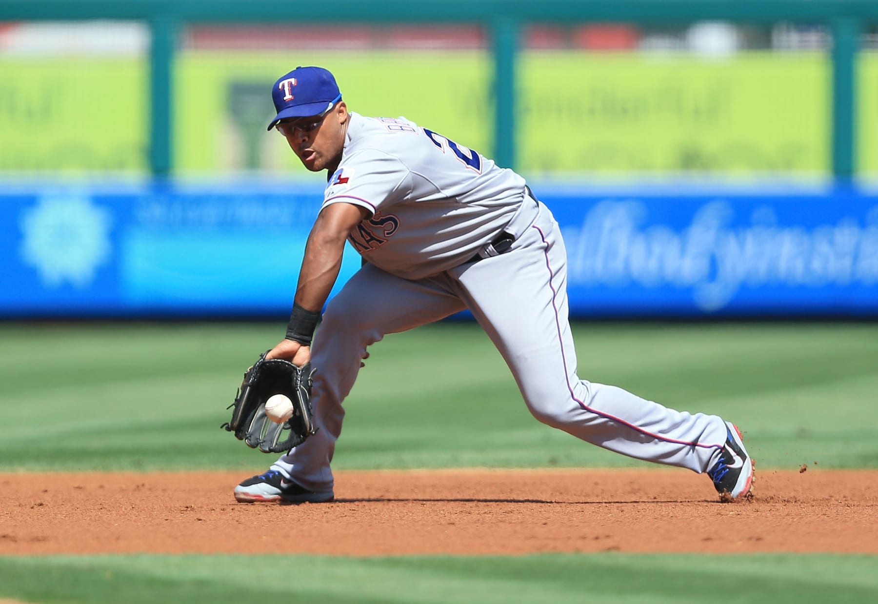 ANAHEIM, CA - SEPTEMBER 21:  Adrian Beltre #29 of the Texas Rangers fields a ground ball to third base in the first inning during the MLB game against the Los Angeles Angels of Anaheim at Angel Stadium of Anaheim on September 21, 2014 in Anaheim, California. The Rangers defeated the Angels 2-1.  (Photo by Victor Decolongon/Getty Images) 