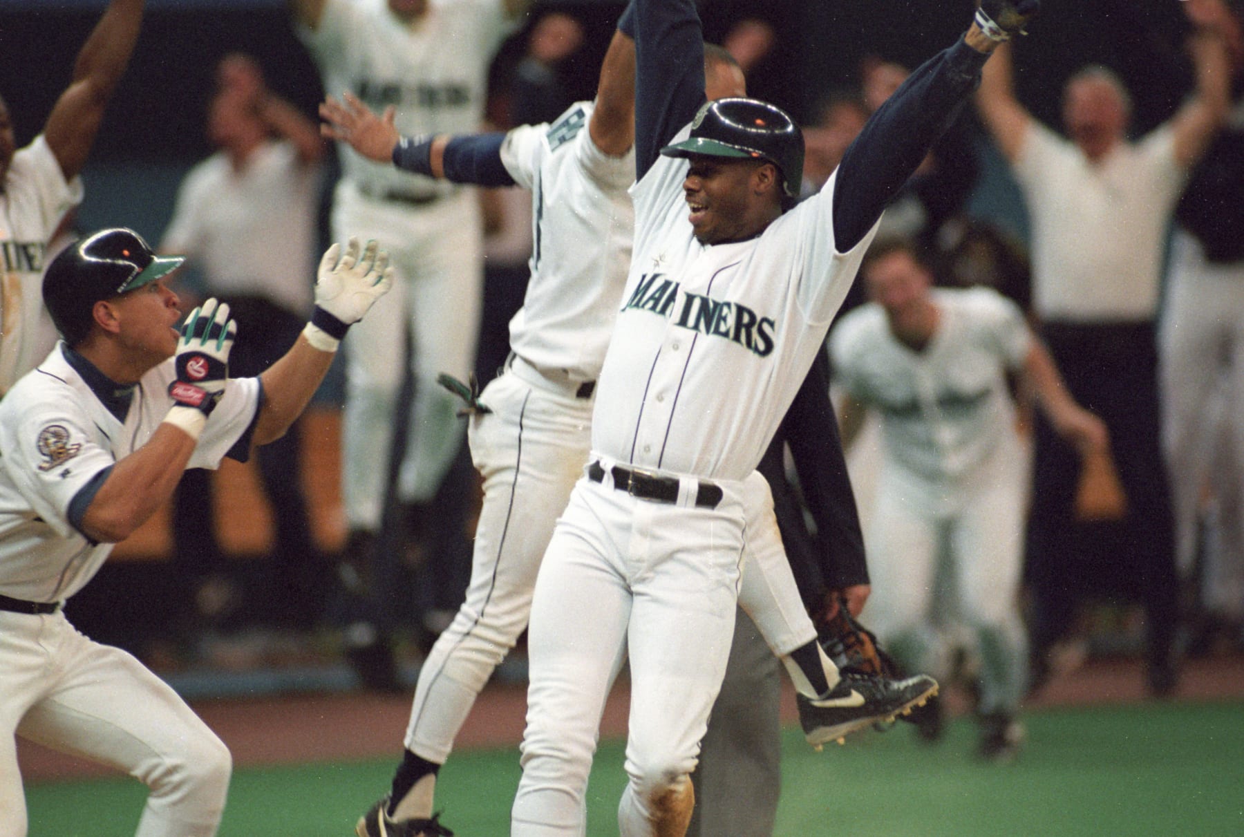 Baseball: Seattle Mariners Ken Griffey Jr. (24) victorious after scoring winning run vs New York Yankees at Kingdome. Game 5. 
Seattle, WA 10/16/1995
CREDIT: Richard Mackson (Photo by Richard Mackson /Sports Illustrated via Getty Images)
(Set Number: X49323 TK5 R23 F7 )