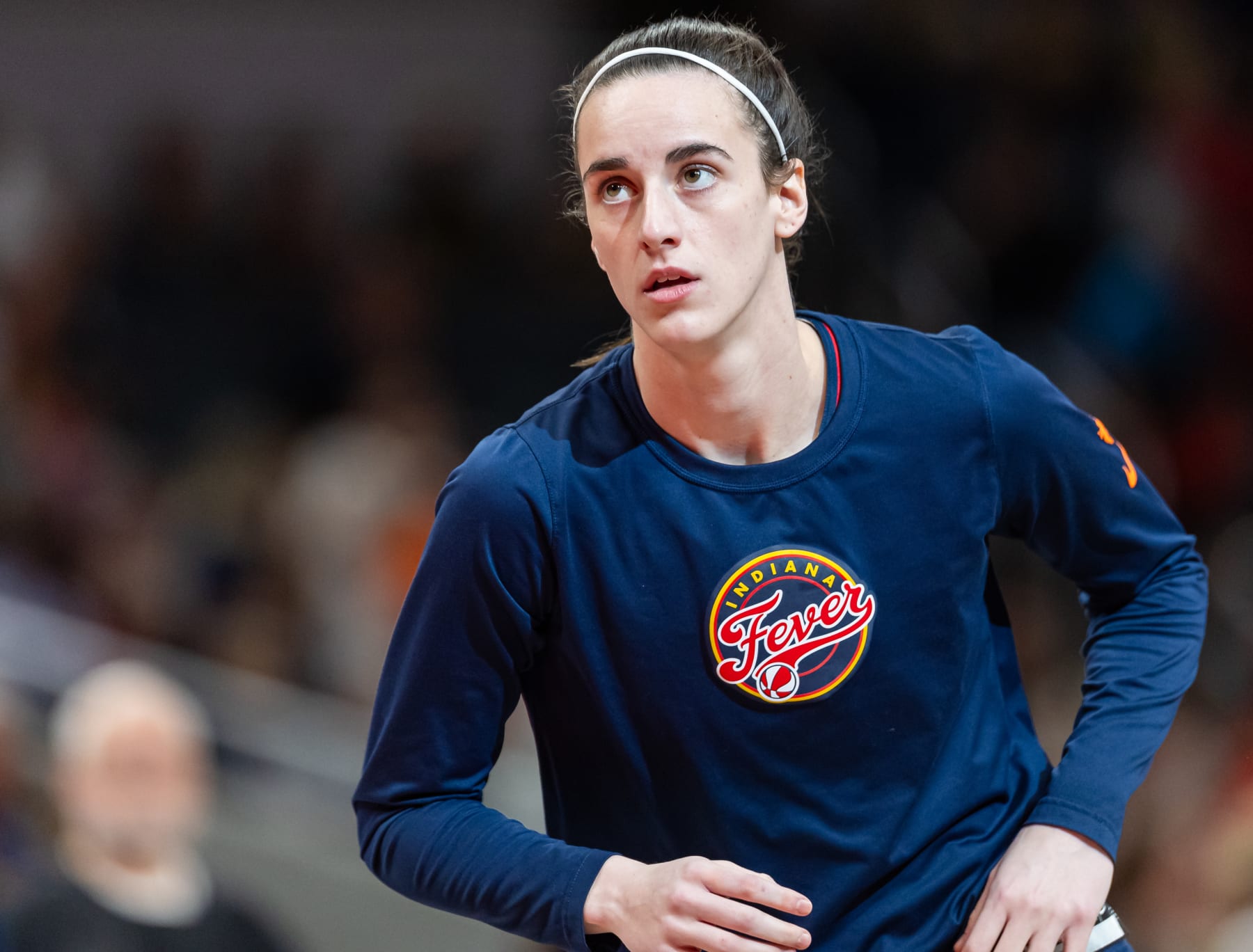 INDIANAPOLIS, INDIANA - JULY 12: Caitlin Clark #22 of the Indiana Fever is seen during the game before the game against the Phoenix Mercury at Gainbridge Fieldhouse on July 12, 2024 in Indianapolis, Indiana. NOTE TO USER: User expressly acknowledges and agrees that, by downloading and or using this photograph, User is consenting to the terms and conditions of the Getty Images License Agreement. (Photo by Michael Hickey/Getty Images)