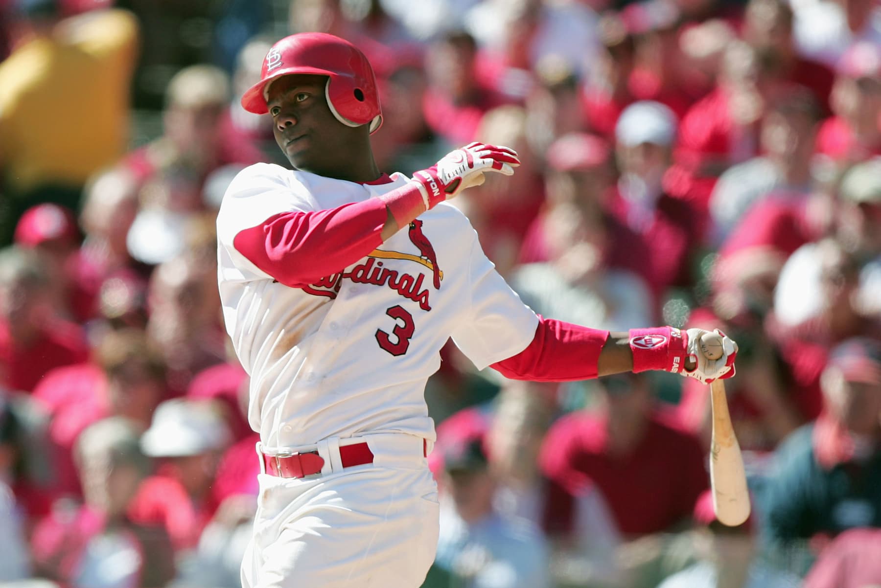 ST LOUIS - OCTOBER 5:  Edgar Renteria #3 of the St. Louis Cardinals hits a two run double against the Los Angeles Dodgers in Game one of National League Division Series during the 2004 Major League Baseball Playoffs on October 5, 2004 at Busch Stadium in St. Louis, Missouri.  (Photo By Jed Jacobsohn/Getty Images)
