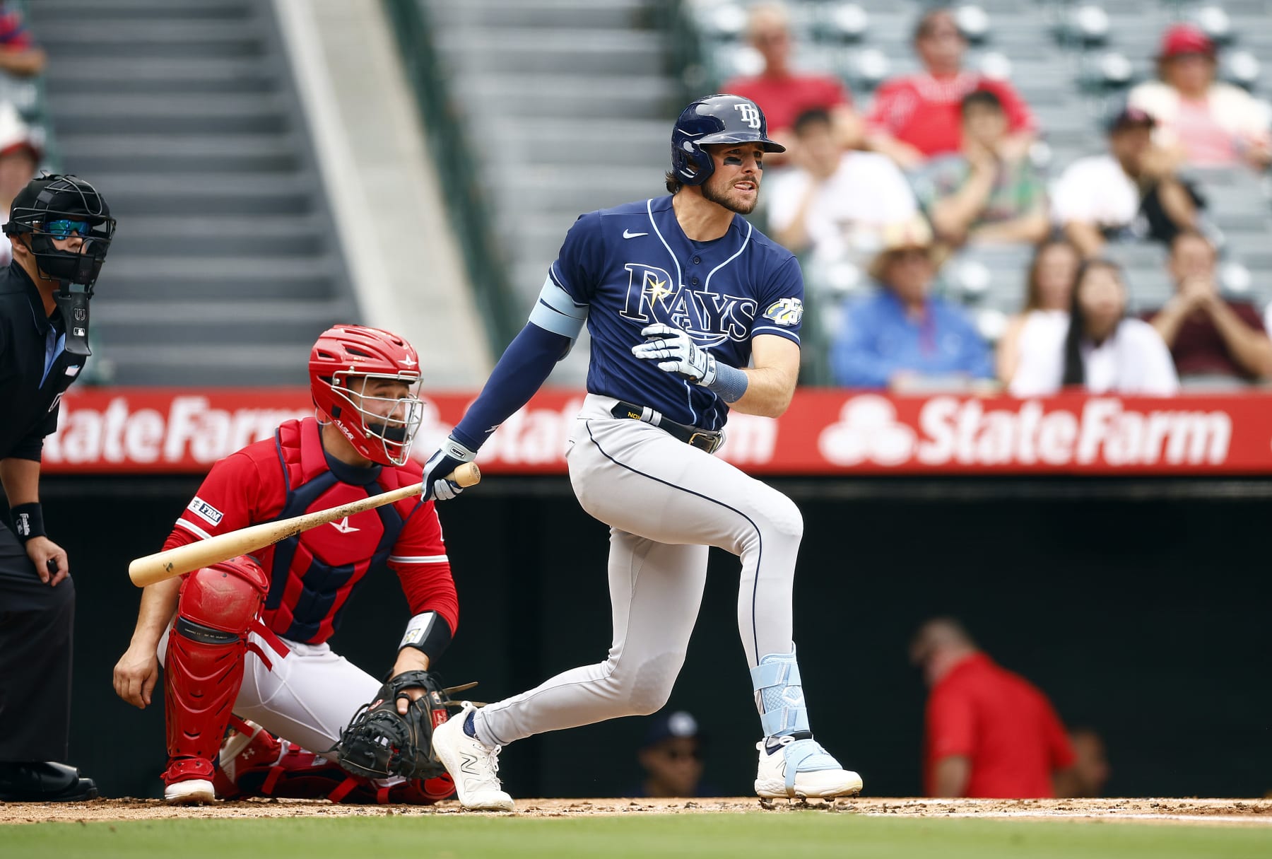 ANAHEIM, CALIFORNIA - AUGUST 19:   Josh Lowe #15 of the Tampa Bay Rays hits a two-run single against the Los Angeles Angels during game one of a doubleheader at Angel Stadium of Anaheim on August 19, 2023 in Anaheim, California. (Photo by Ronald Martinez/Getty Images)