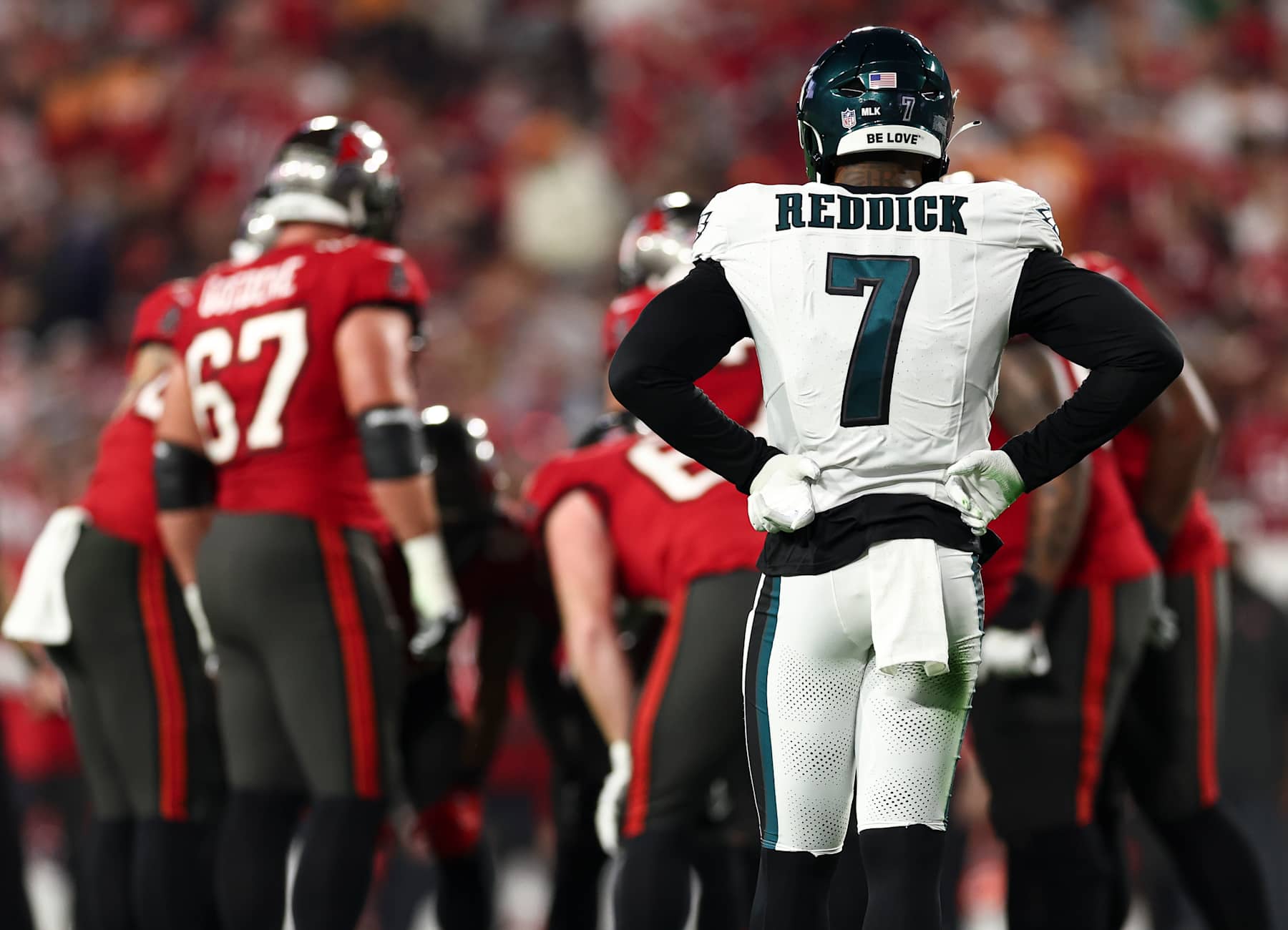TAMPA, FL - JANUARY 15: Haason Reddick #7 of the Philadelphia Eagles looks on as the Tampa Bay Buccaneers offense huddles during an NFL wild-card playoff football game at Raymond James Stadium on January 15, 2024 in Tampa, Florida. (Photo by Kevin Sabitus/Getty Images)