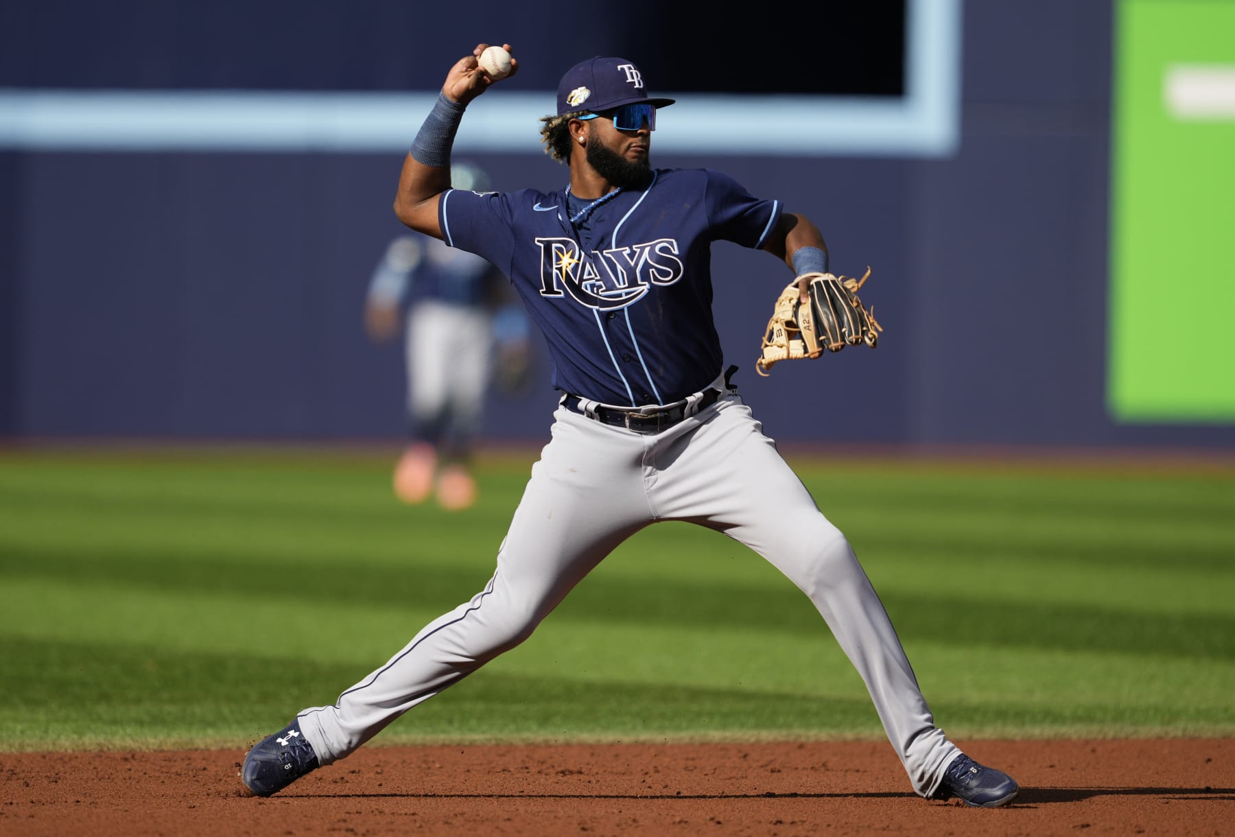TORONTO, ON - OCTOBER 1: Junior Caminero #1 of the Tampa Bay Rays fields a ball against the Toronto Blue Jays during the first inning in their MLB game at the Rogers Centre on October 1, 2023 in Toronto, Ontario, Canada. (Photo by Mark Blinch/Getty Images)