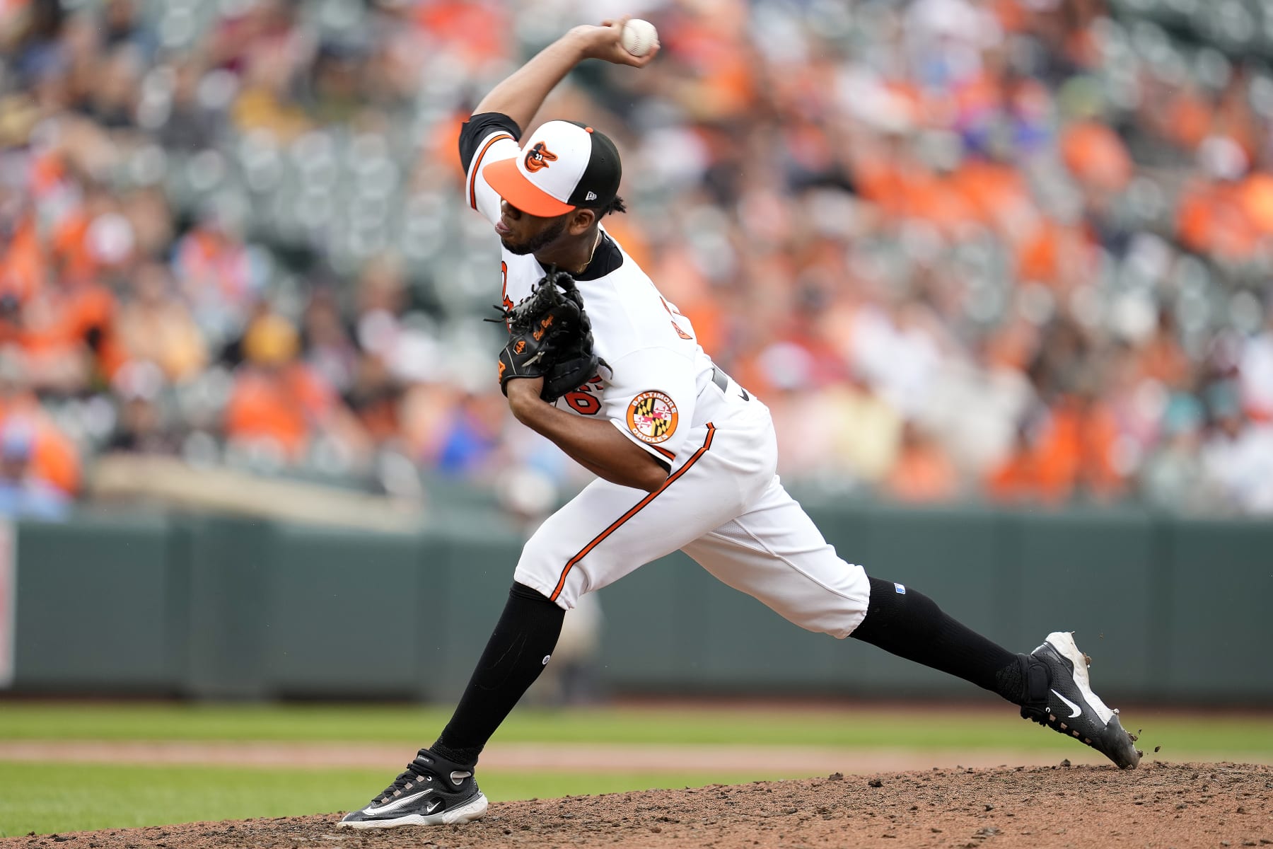 BALTIMORE, MD - JULY 16:  Eduard Bazardo #67 of the Baltimore Orioles pitches during a baseball game against the Miami Marlins at Oriole Park at Camden Yards on July 16, 2023 in Baltimore, Maryland.  (Photo by Mitchell Layton/Getty Images)