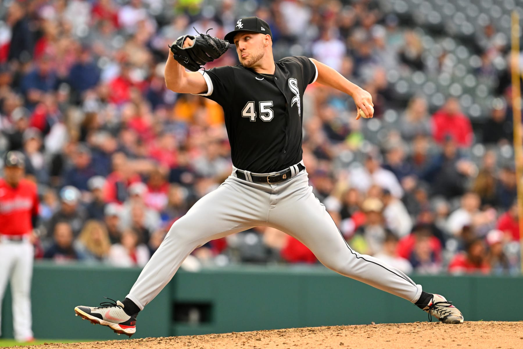 CLEVELAND, OHIO - MAY 22: Relief pitcher Garrett Crochet #45 of the Chicago White Sox pitches during the seventh inning against the Cleveland Guardians at Progressive Field on May 22, 2023 in Cleveland, Ohio. (Photo by Jason Miller/Getty Images)