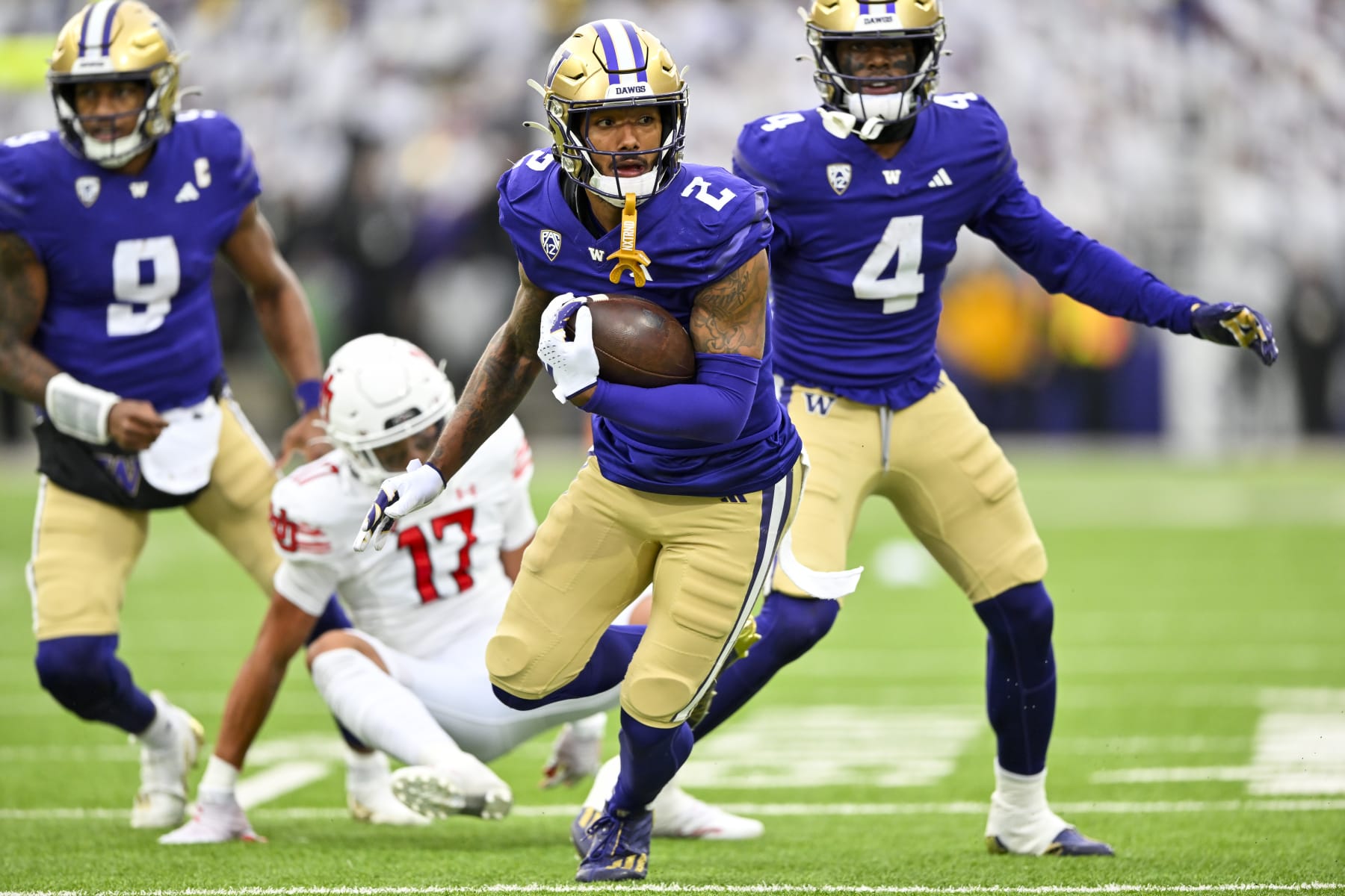 SEATTLE, WASHINGTON - NOVEMBER 11: Ja'Lynn Polk #2 of the Washington Huskies in action during the fourth quarter against the Utah Utes at Husky Stadium on November 11, 2023 in Seattle, Washington. The Washington Huskies won 35-28. (Photo by Alika Jenner/Getty Images)